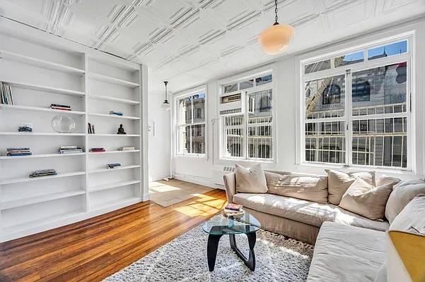 WELCOME TO RESIDENCE #5. A SOUTH-FACING FULL-FLOOR LOFT WITH TWO BEDROOMS, TWO FULL BATHS, AND SUPER HIGH 11FT CEILINGS
