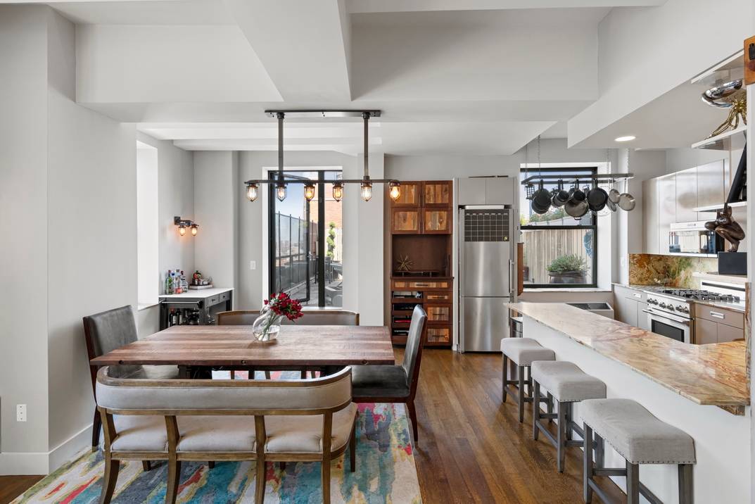 This one-of-a-kind triplex penthouse with private outdoor space is everything you’re looking for!