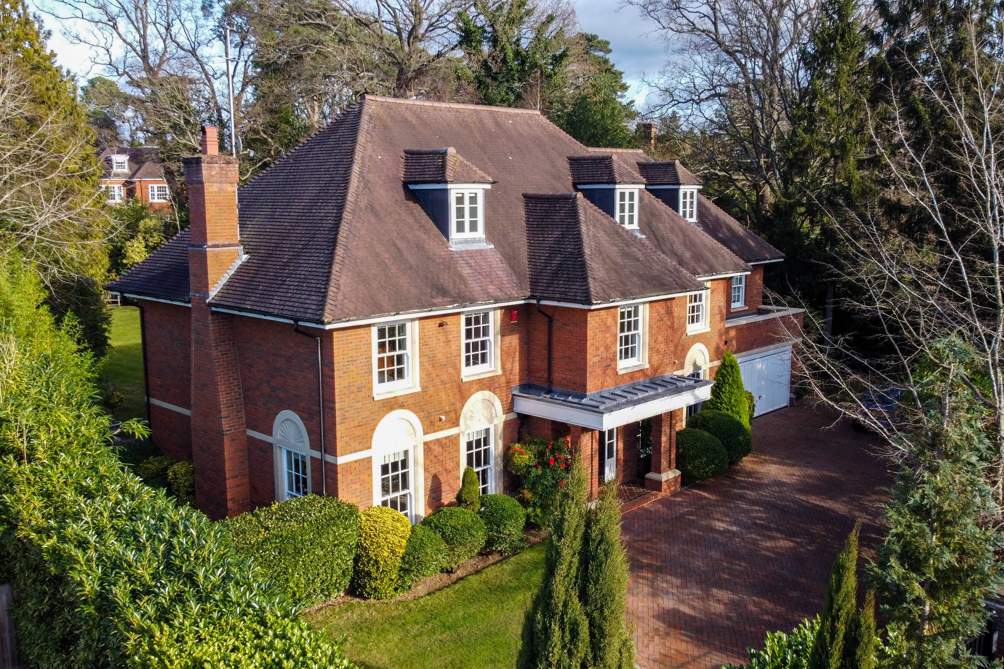 A stunning home hidden by nature on one of Sunningdale's most private roads
