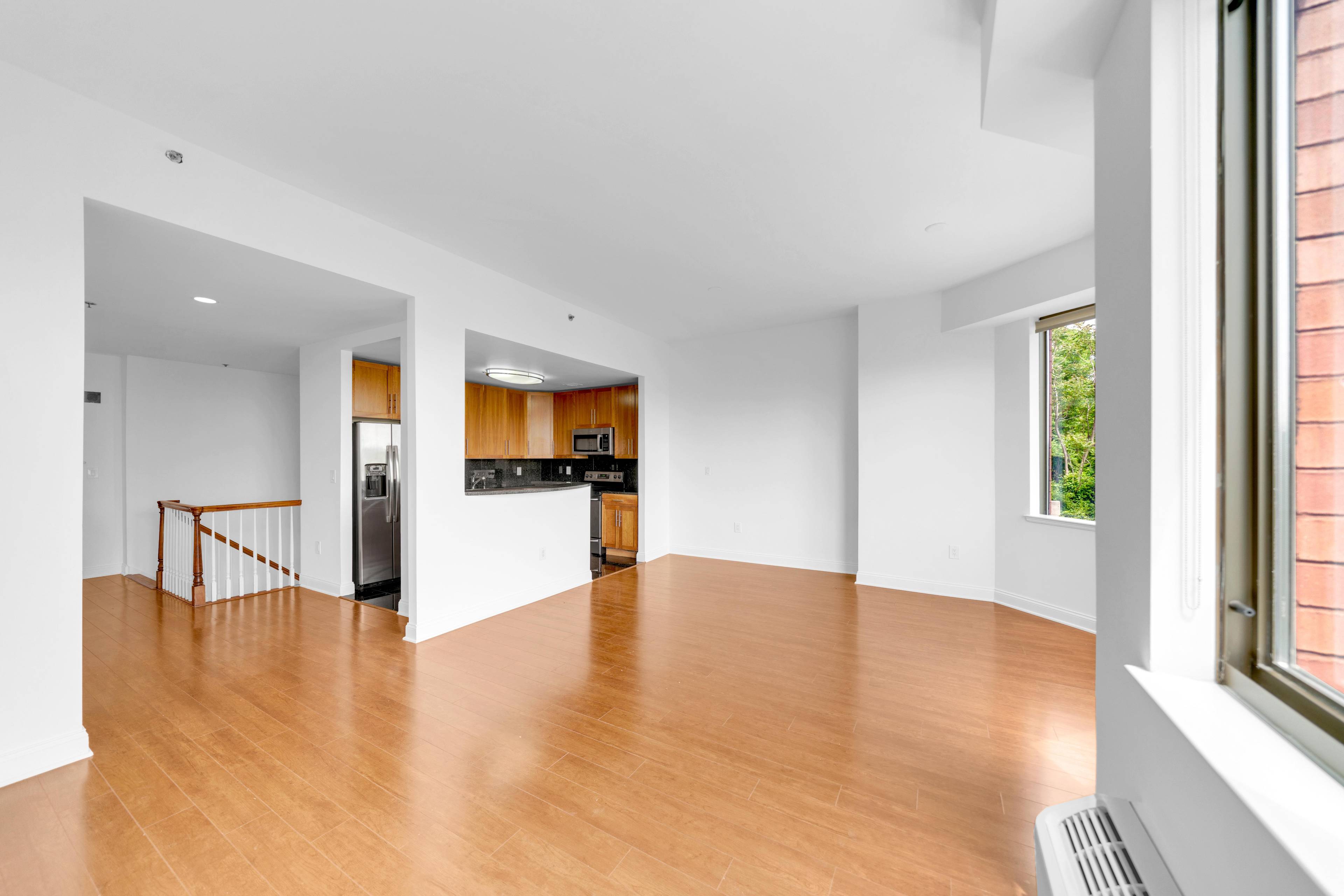 Rarely Available 3 Bedroom 2 Bath Duplex Home located at the Riello!  Private Outdoor Space and Private Parking Garage!