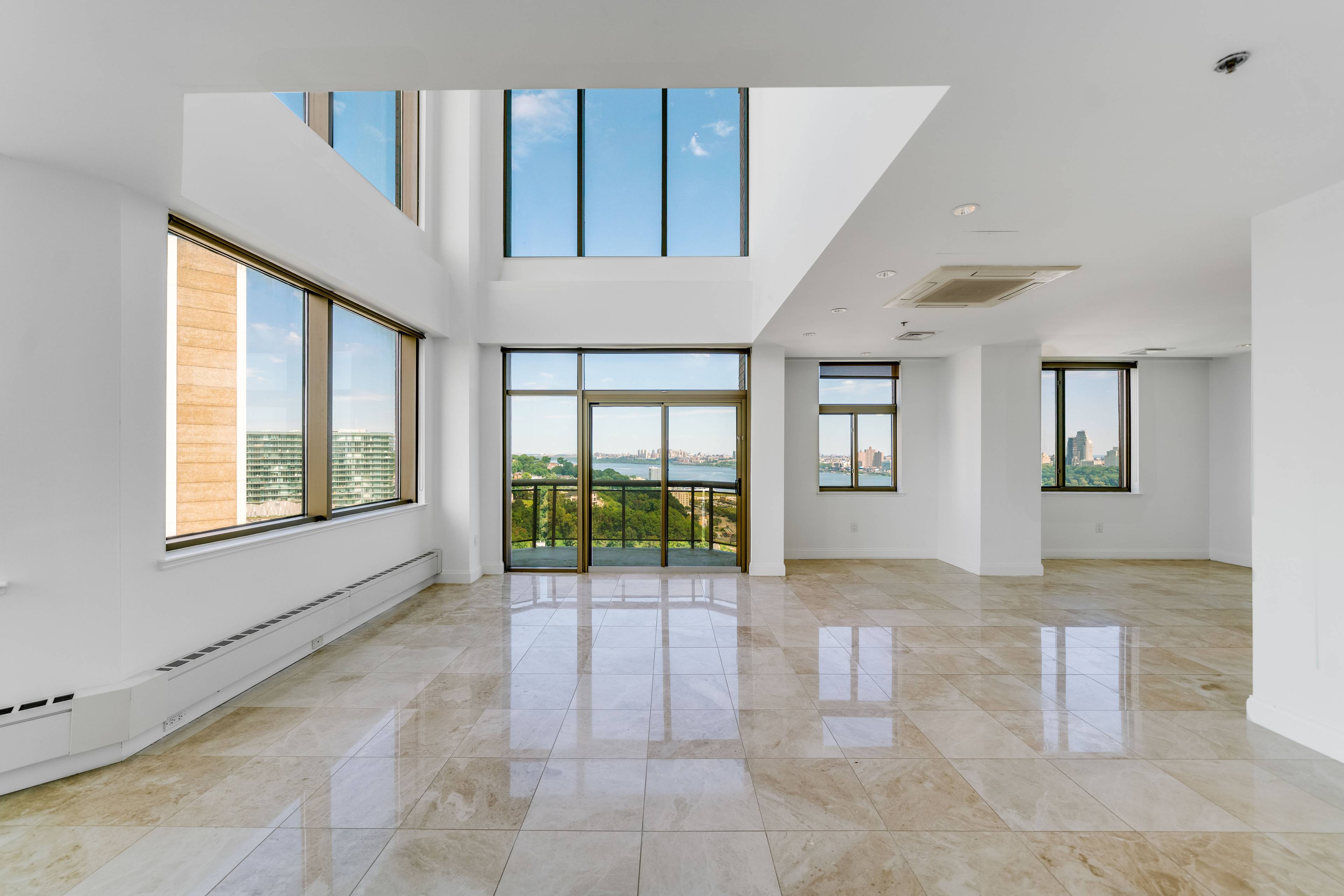 Penthouse 2504 Now Available at The Riello!  Duplex Apartment!  Soaring Ceilings and Views for Miles!