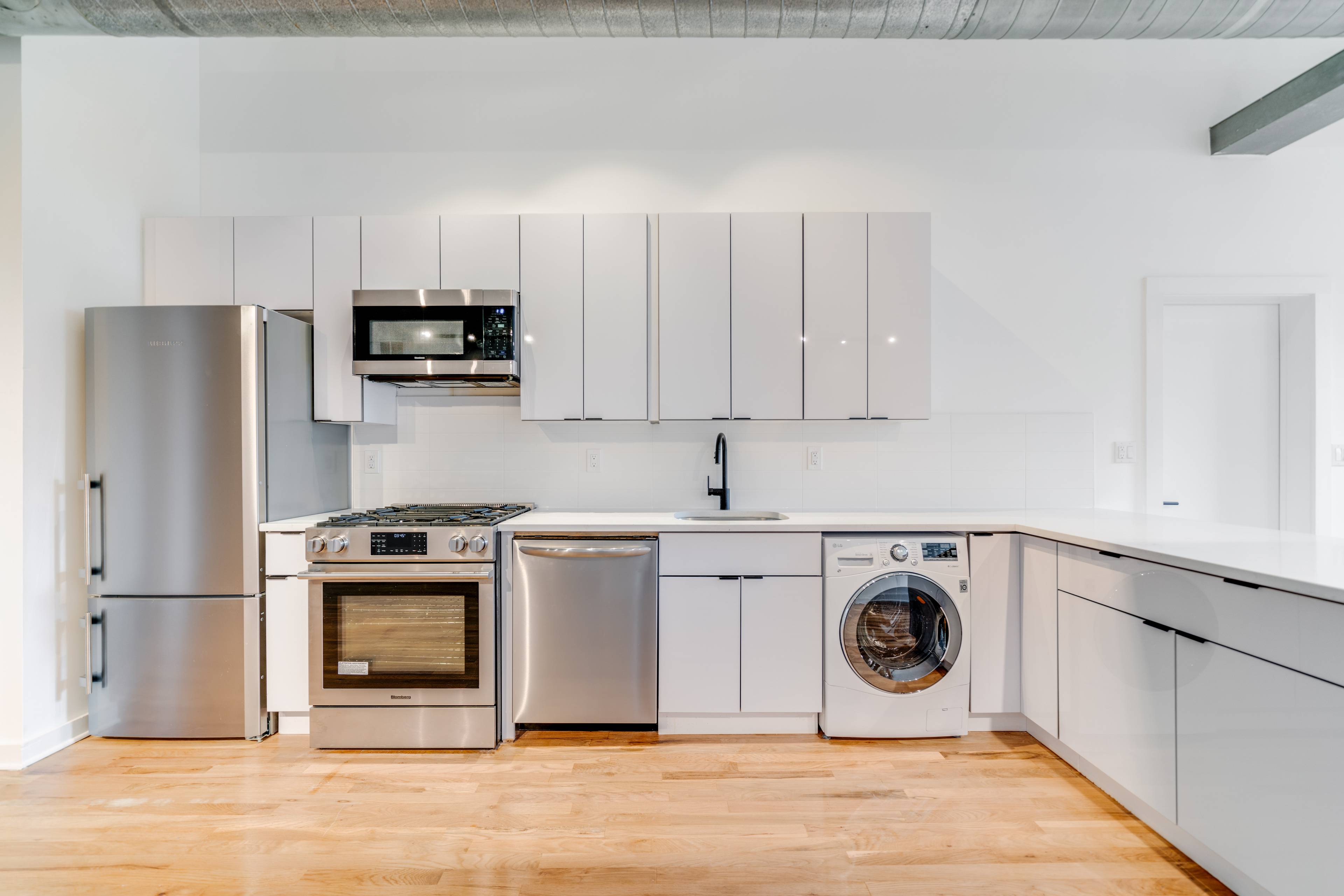 Newly Renovated 3 Bedroom 1 Bath Loft Space!  High Ceilings!  Elevator Building