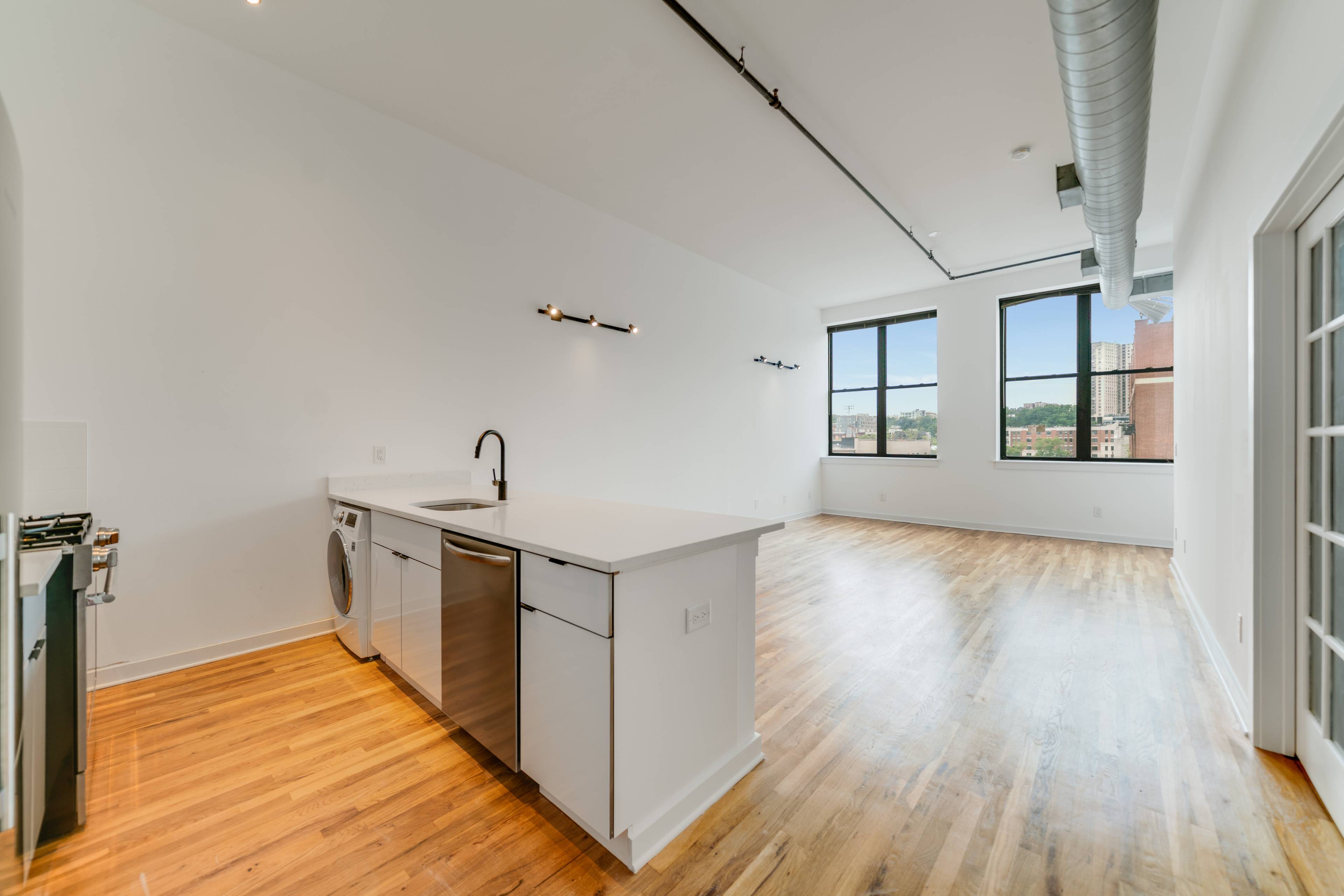 Stunning New Renovation located at 1015 Clinton Street!  Huge Soaring Ceilings! 3 King Size bedrooms!  Laundry In Unit!  Private Backyard!!