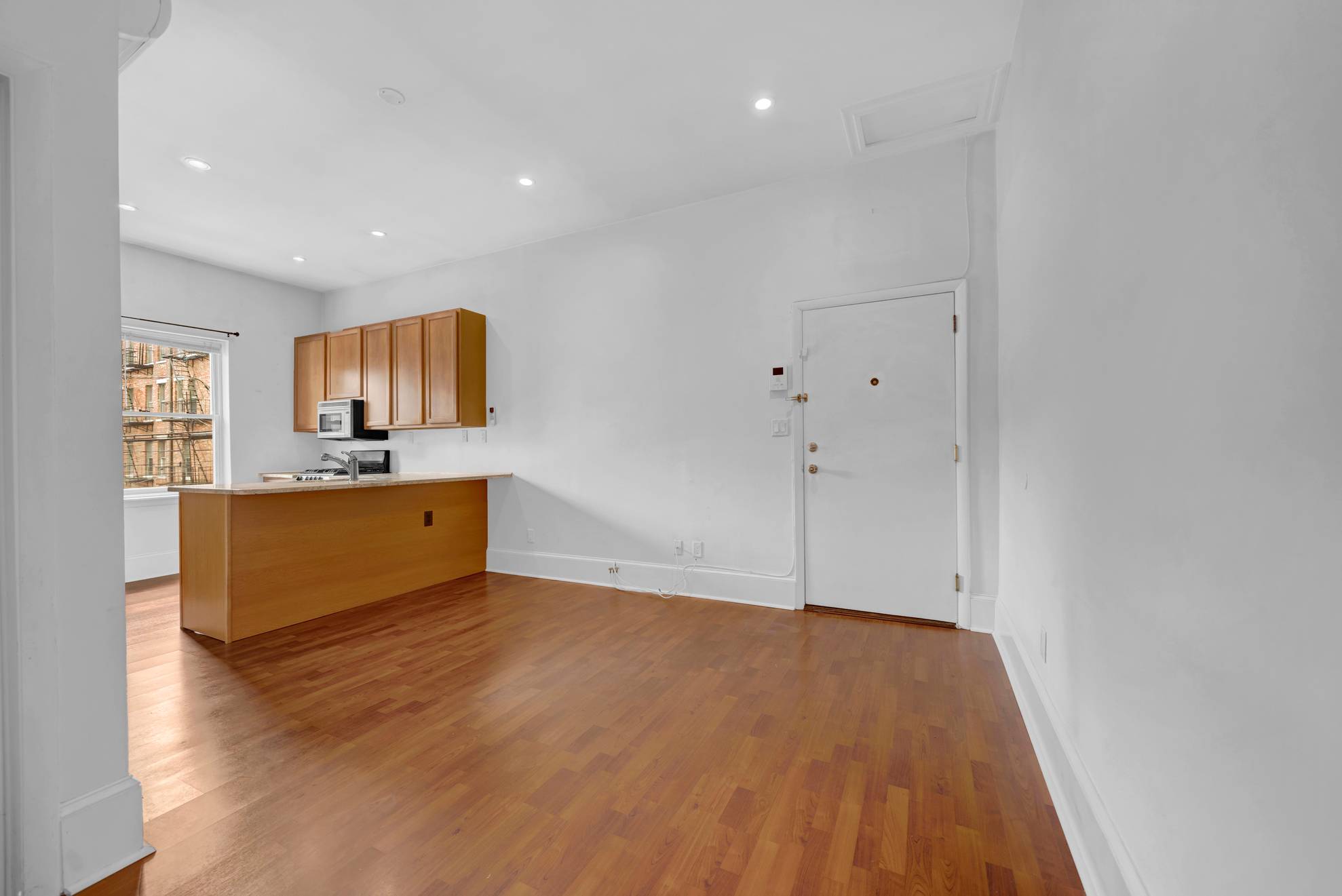 Beautiful One Bedroom Home located in Downtown Hoboken.  Wall AC Units!  Laundry Machines On Site!