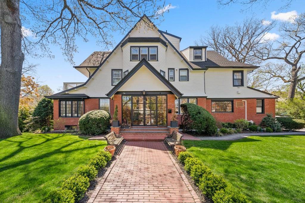 Gated Colonial Revival Dream Home with Carriage House Studio and Garage