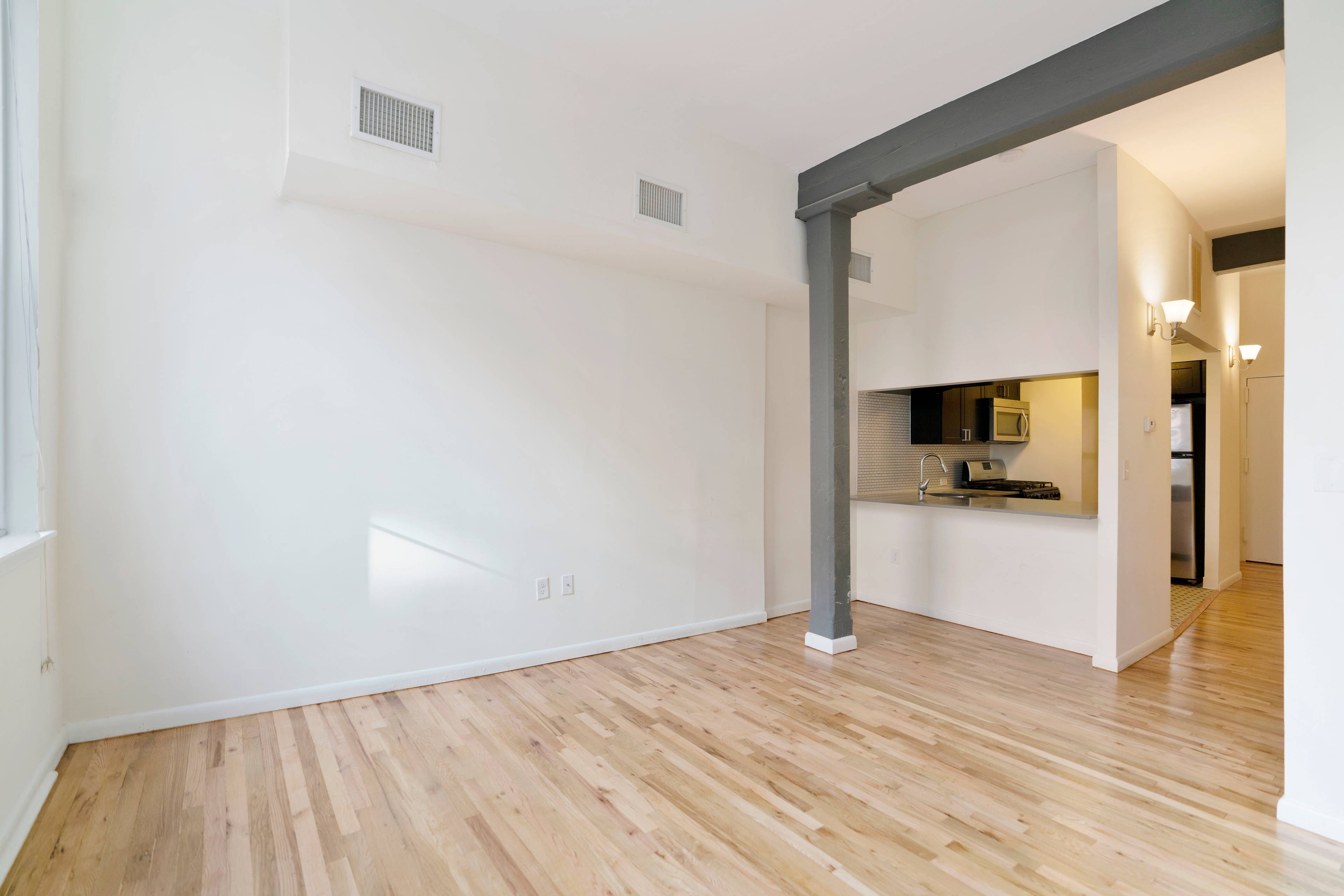 Rarely Available 975 Sqft 2BR 1.5BA Duplex Luxury Loft in the heart of Hoboken NJ. Corner Unit