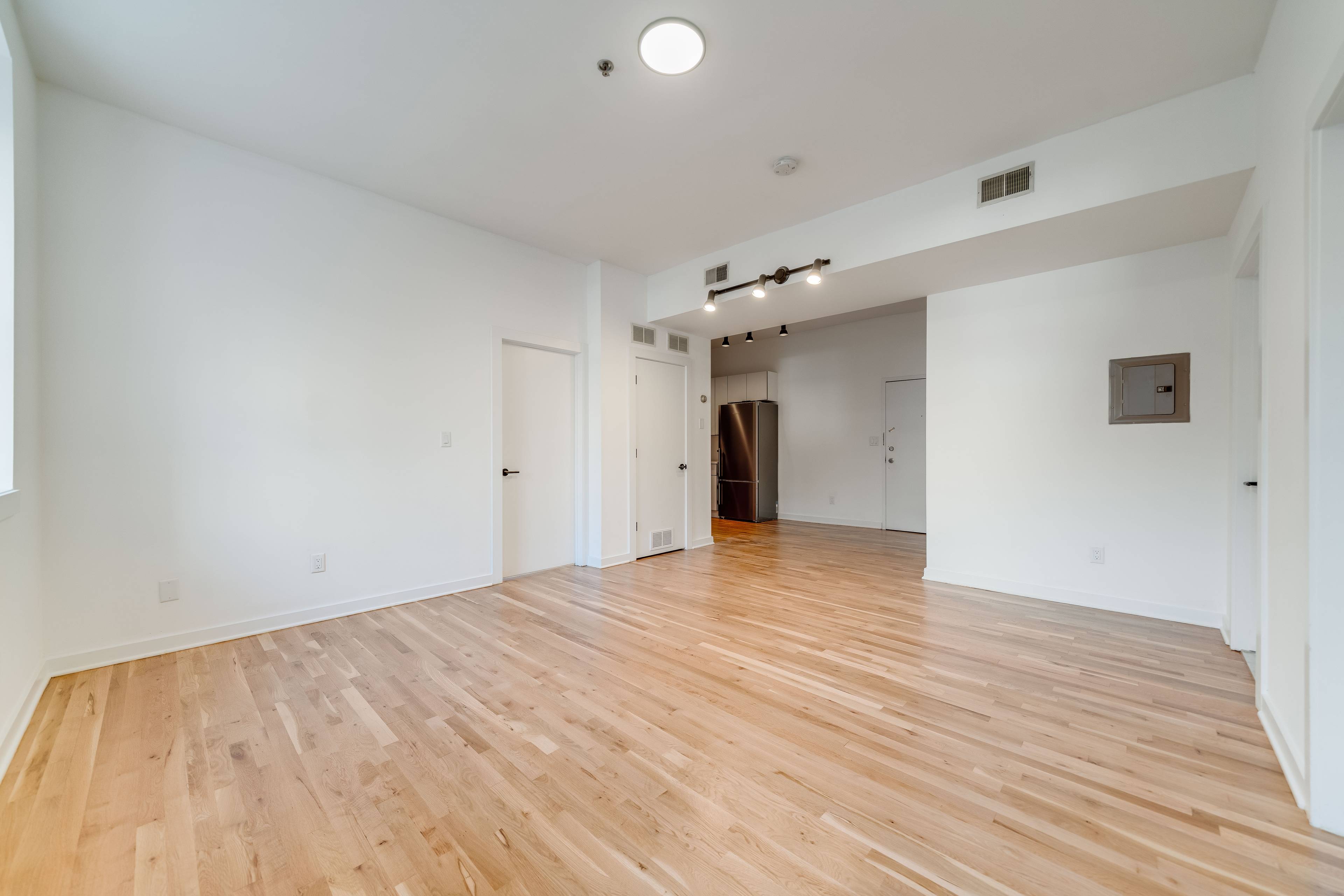 Newly Renovated 2 Bedroom 1 Bath Apartment located at 716 Madison Street.  Laundry In Unit!  Central AC and Heating!