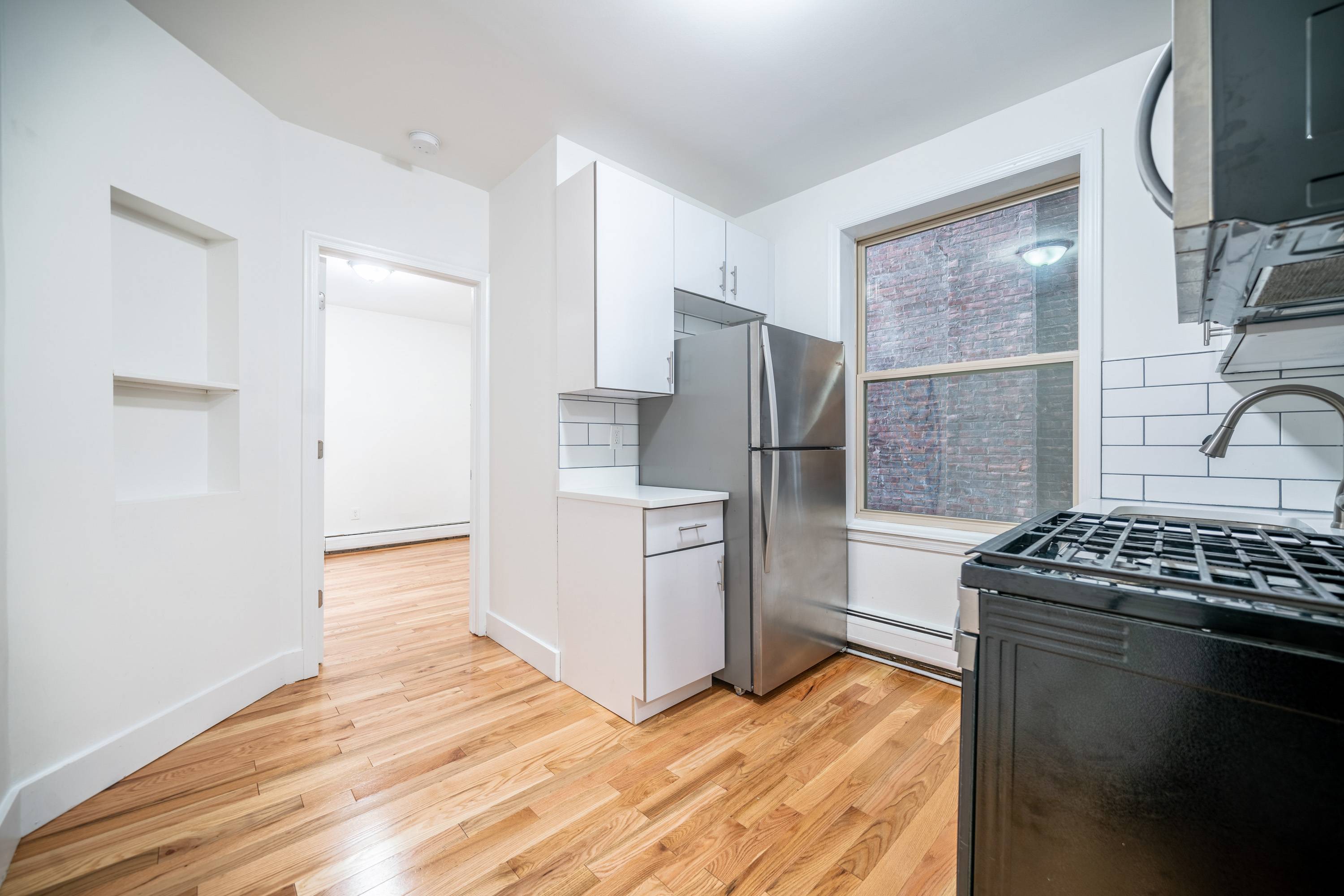 Stunning Renovated 1BR Located Across the Street from the Journal Square Transportation Center and Path Station! Laundry On Site, On Site Super, No Broker Fees.