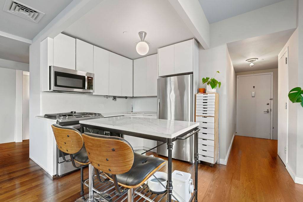 Rare DUMBO Loft 1BR: Huge Terrace, Parking Included, W/D and Central A/C