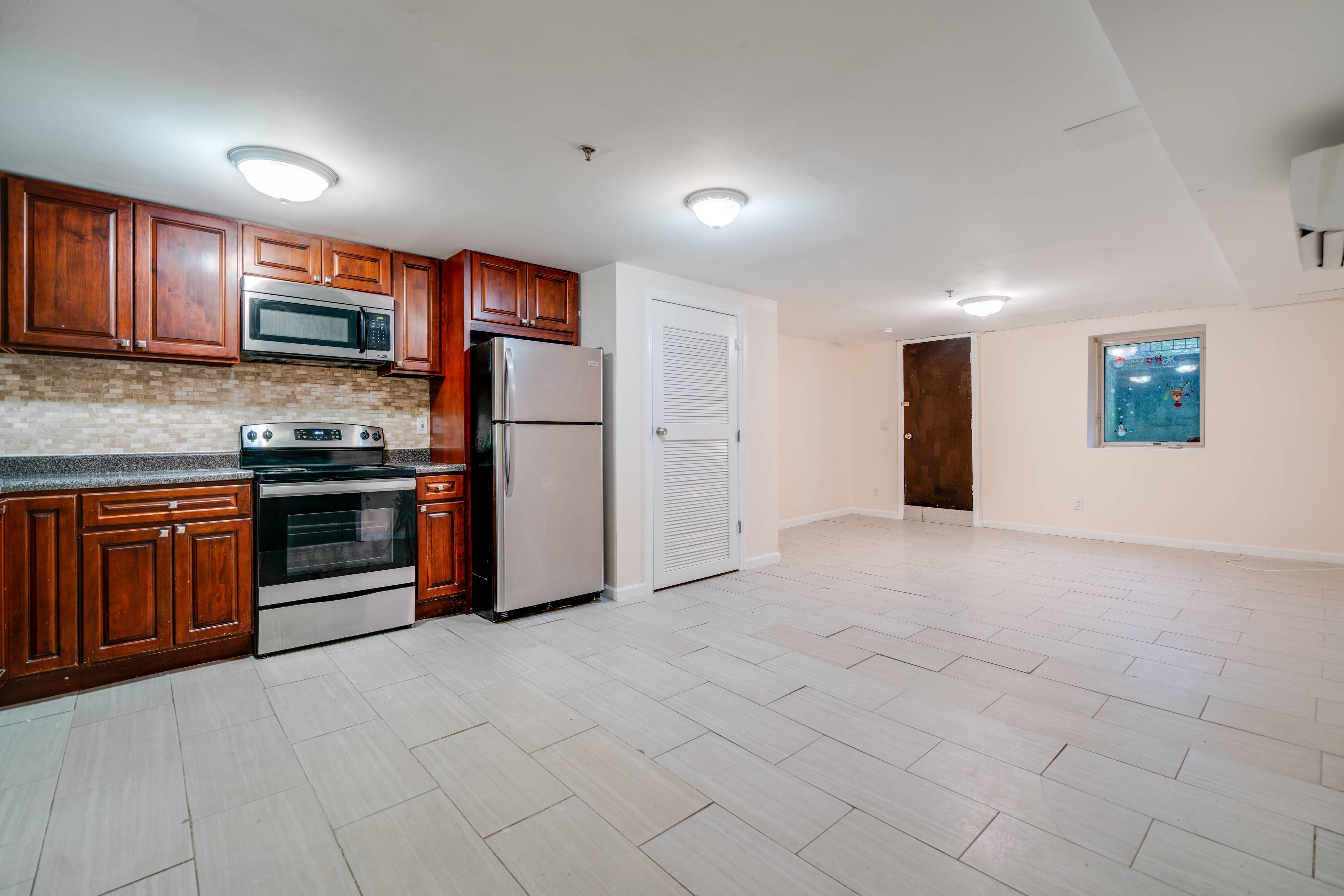 Newly Renovated 3 Bedroom Apartment located in Union City with Small Backyard Area! No brokers Fees!