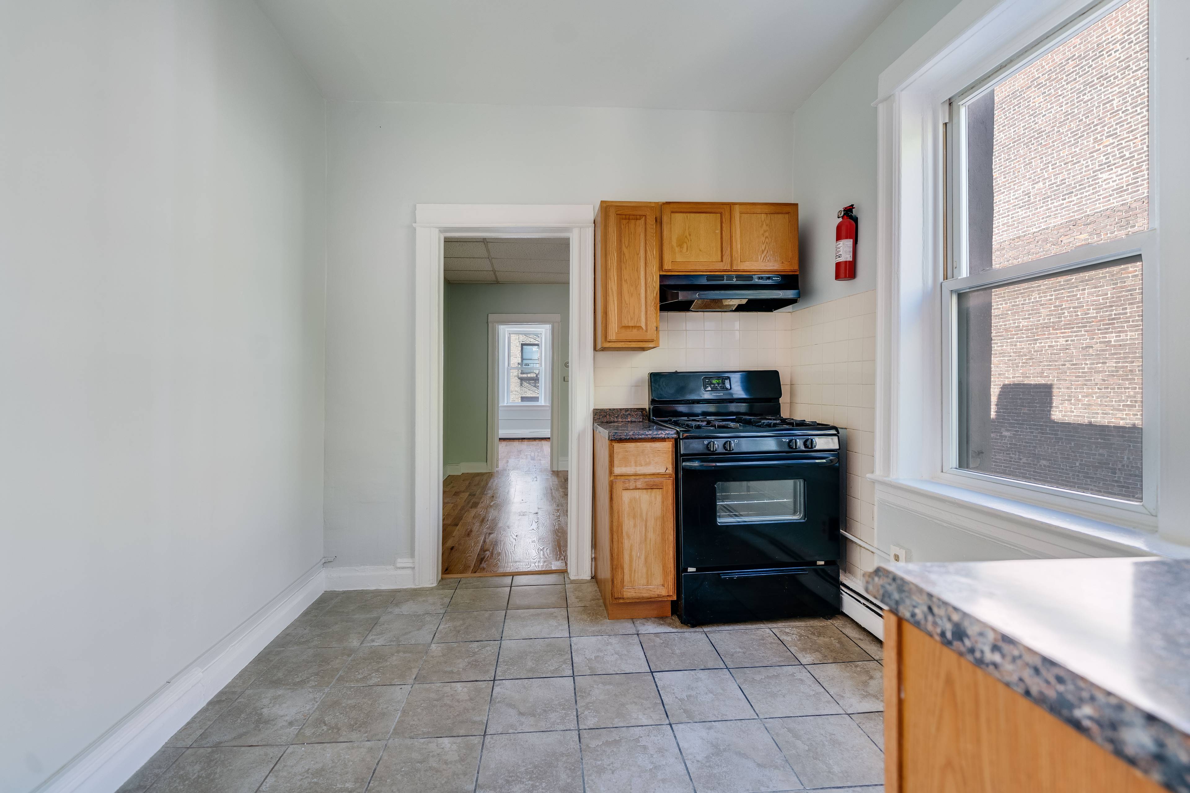 Railroad 1BR with Open Living Room Space!  King Size Bedroom.  No Brokers Fees.