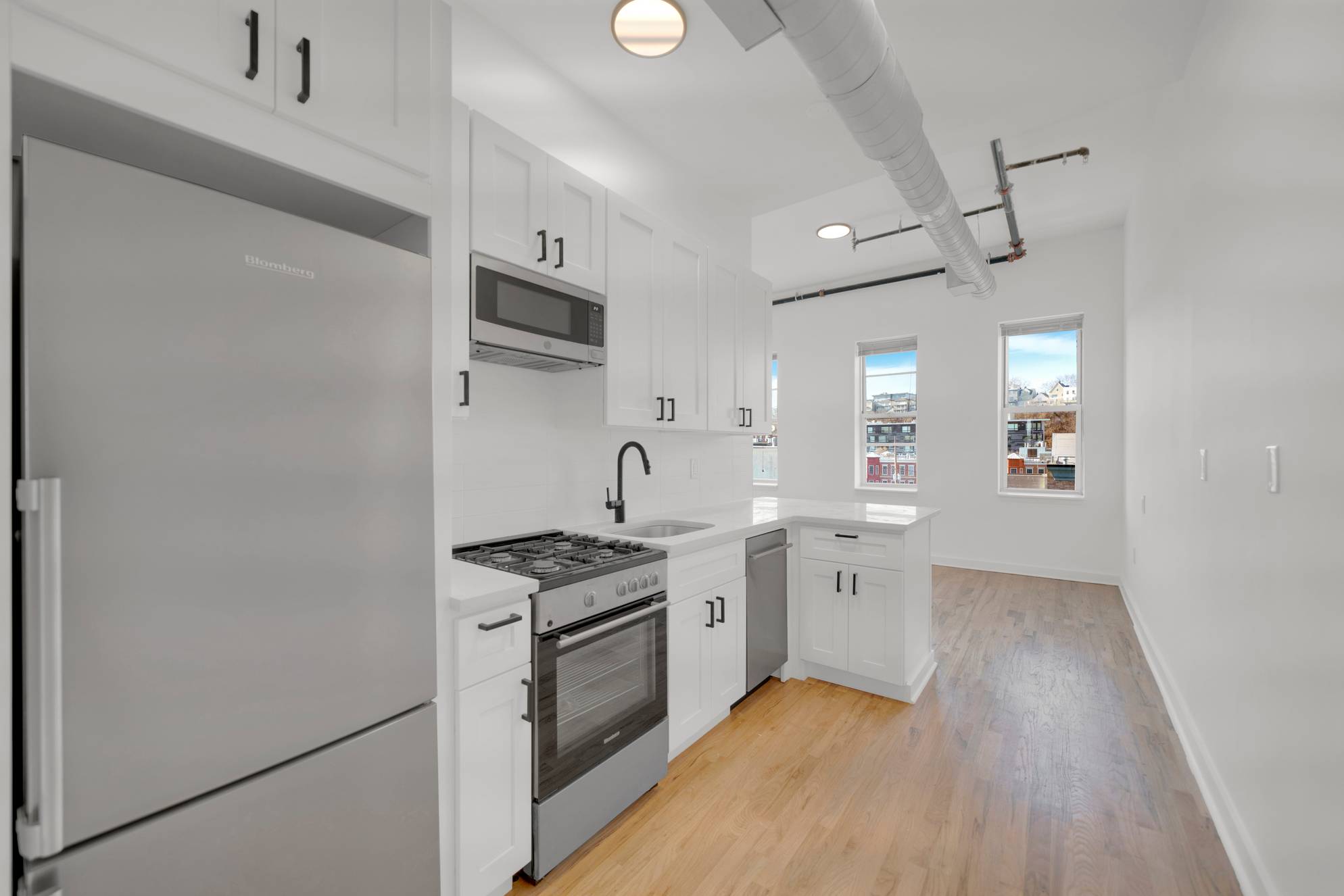 Beautiful Open 1BR 1Ba Soho Loft Style Duplex With Extra Loft/Office Space.  Laundry and Central AC In Unit! $1500 Security for Qualified Renters