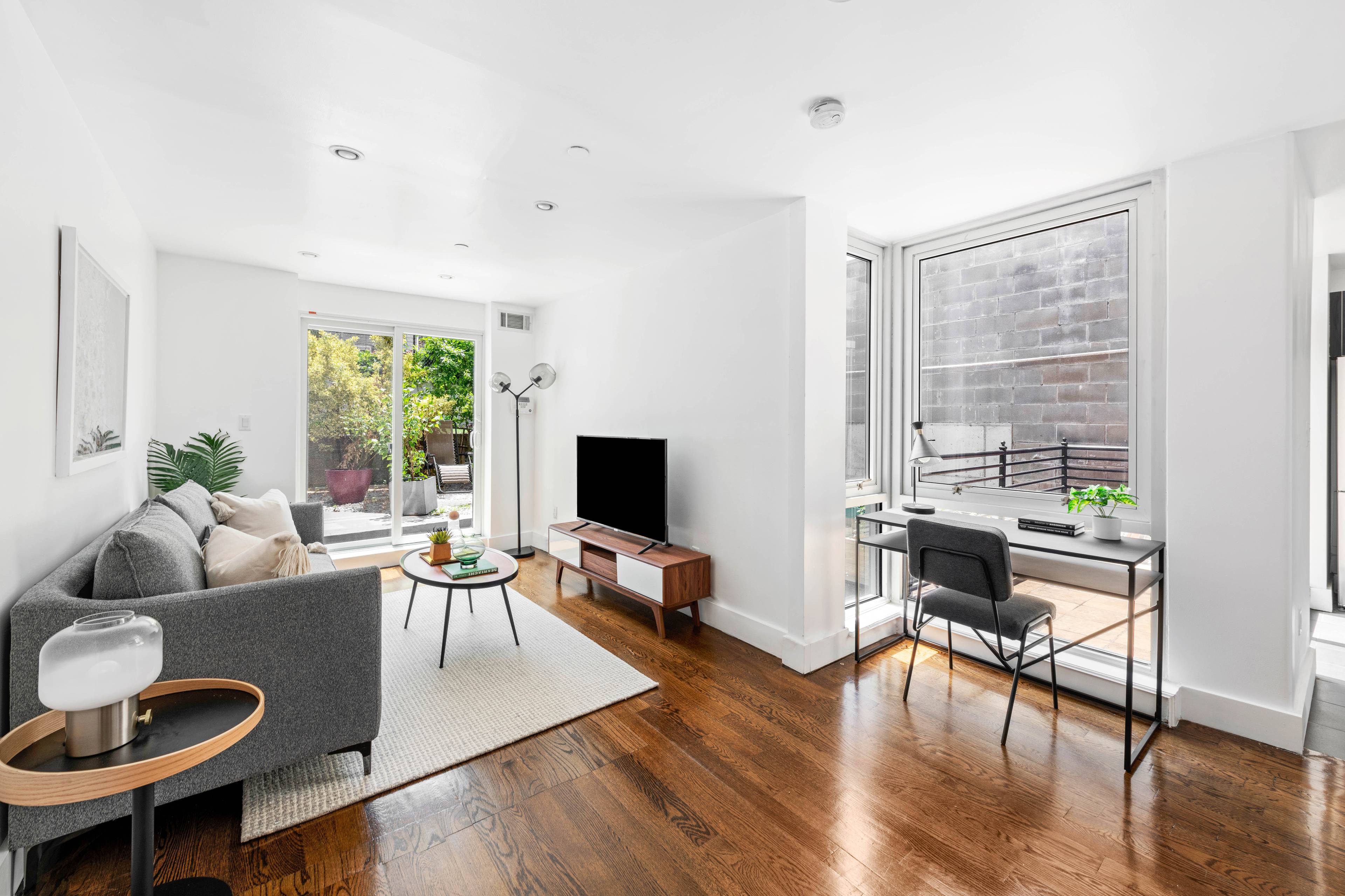 Amazing Investment opportunity or ideal as primary home with over 800 square foot of private outdoor space