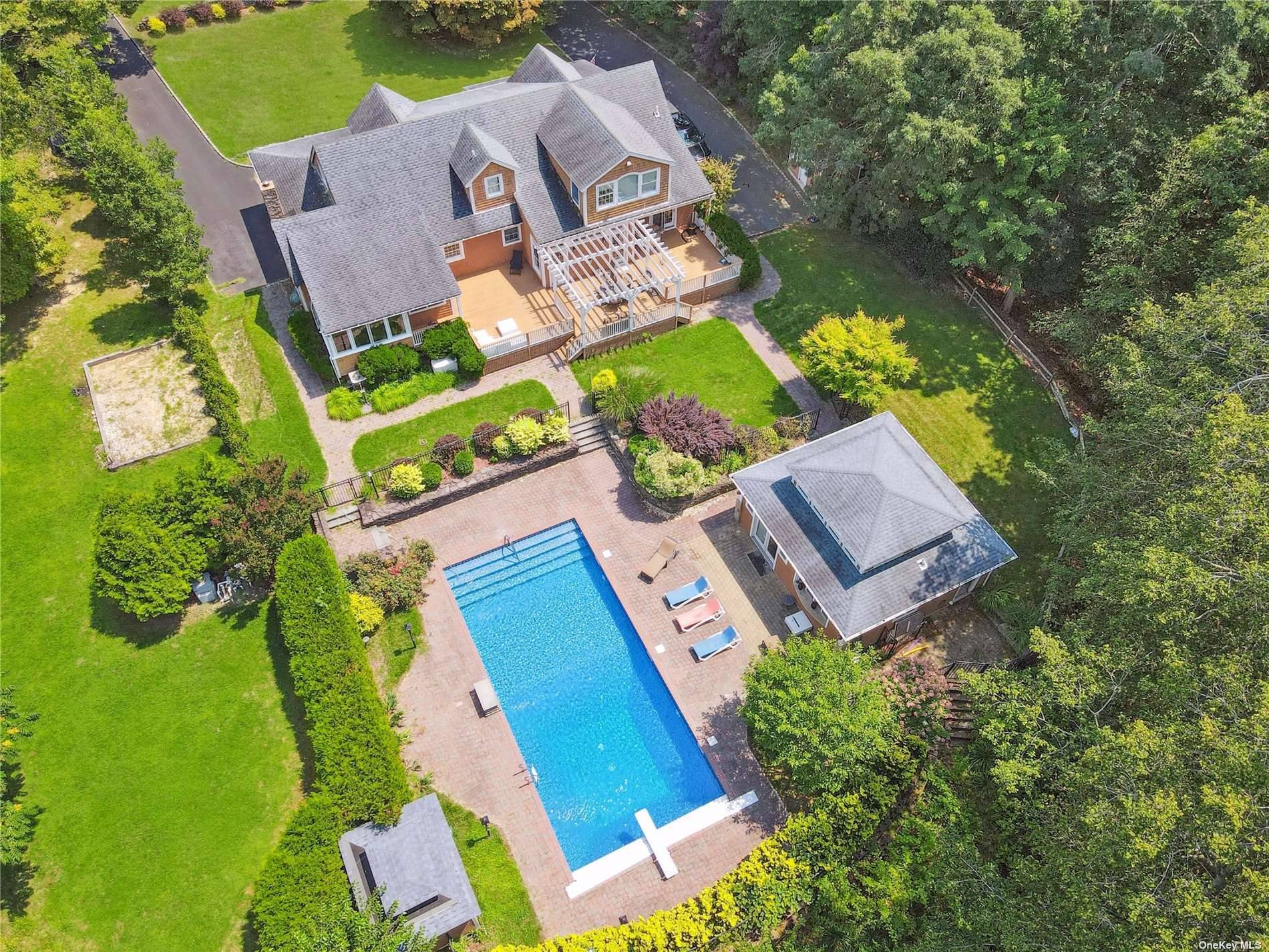Luxurious 4-bedroom, 4.5-bath home nestled in North Wading River.