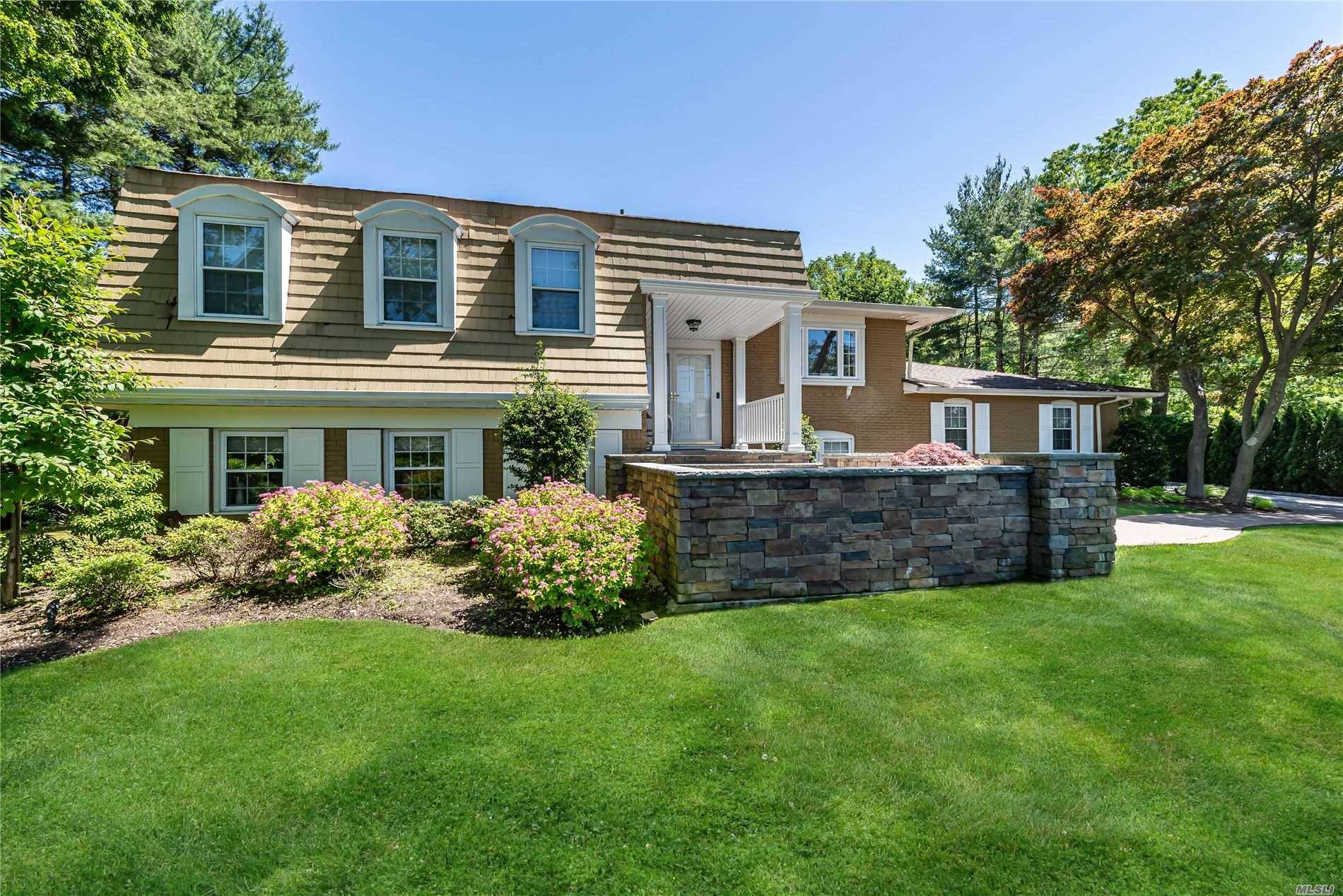 Luxurious Chalet Ranch Nestled On One Acre In Woodbury Estates