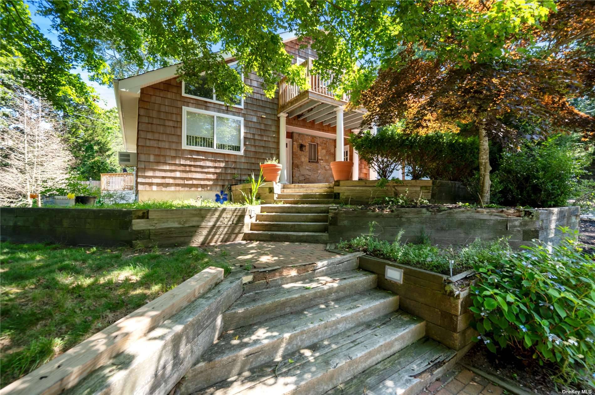 Charming Hampton Bays home just steps away from the water.