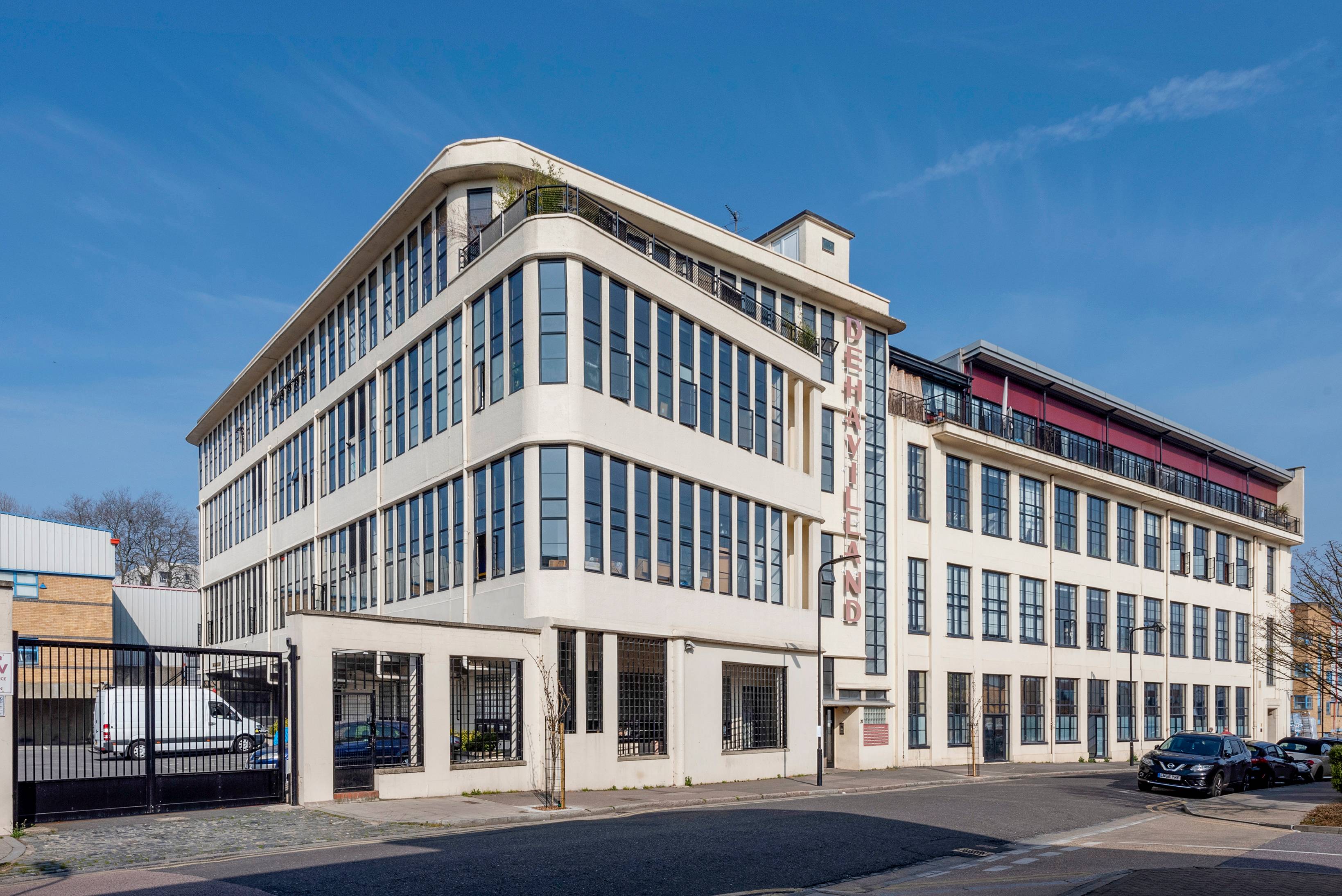 Top floor loft with private terrace and panoramic views at one of East London's most popular industrial conversions, De Havilland Studios.