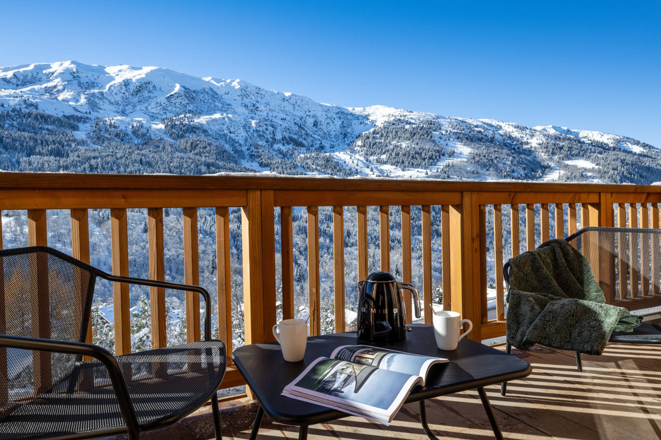 Welcoming Alpine Retreat in Meribel Three Valleys with Stunning Views and a Hot Tub on the Terrace