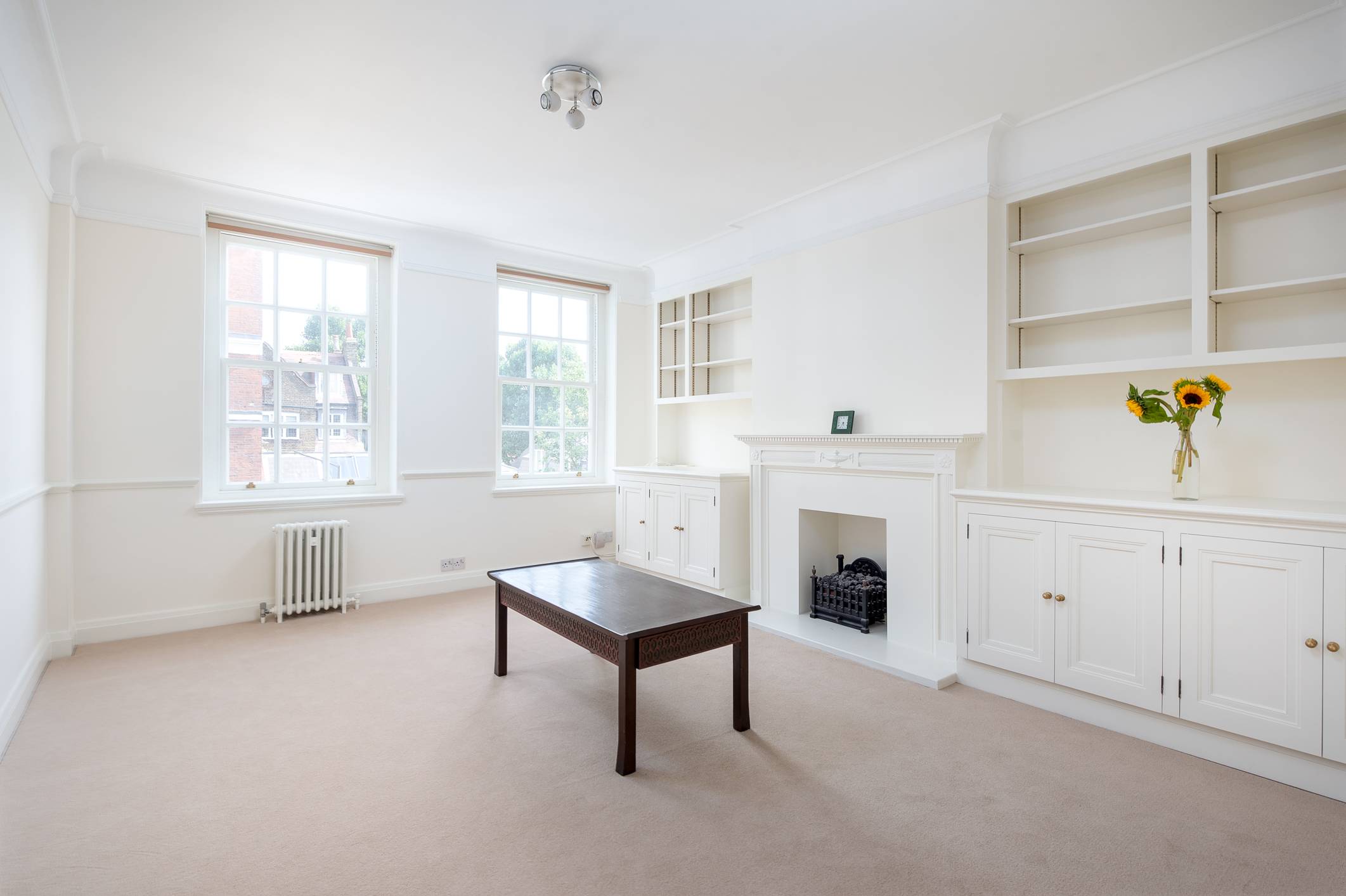 A bright and spacious three-bedroom apartment located on Drayton Gardens in prime Chelsea. This striking red brick mansion block benefits from an on-site porter with lift service.