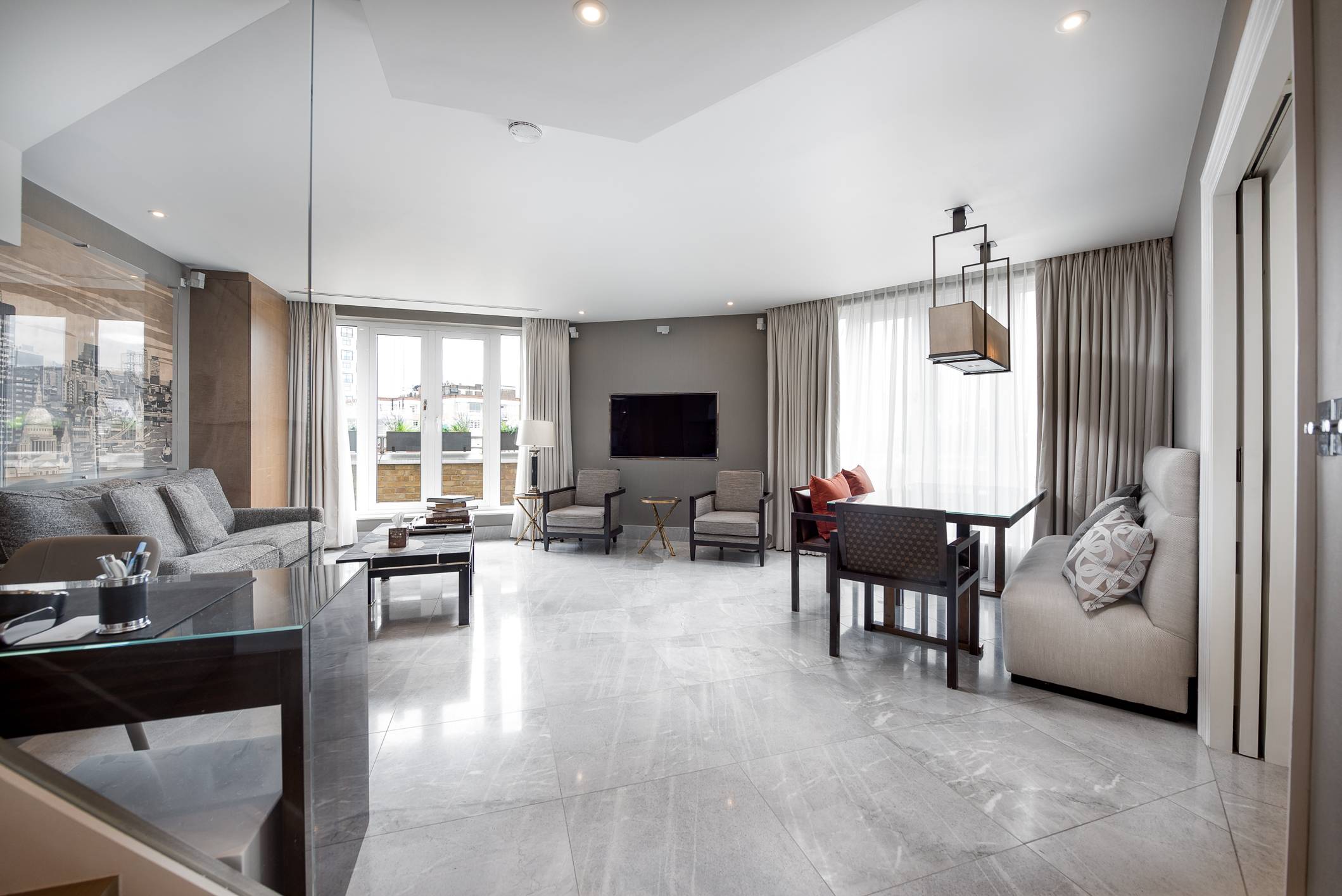 A stunning two-bedroom duplex located in the heart of Knightsbridge, this apartment is situated 100ft from Harrods and benefits from a 24-Hour Concierge with underground parking and valet service.