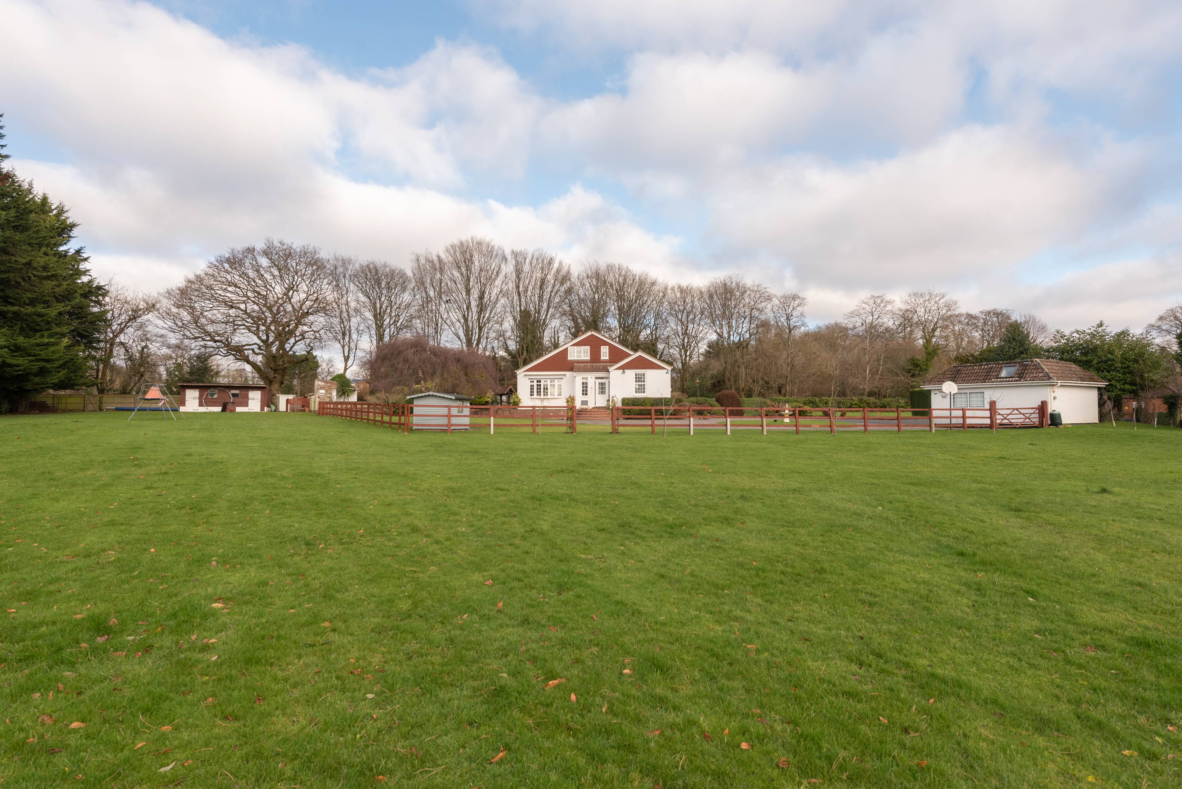 A spacious Family Bungalow with beautiful grounds in the picturesque village of Penn.