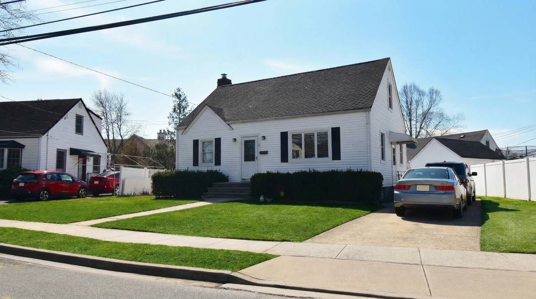 Rare Opportunity Cape Cod in the Heart of Farmingdale Village!