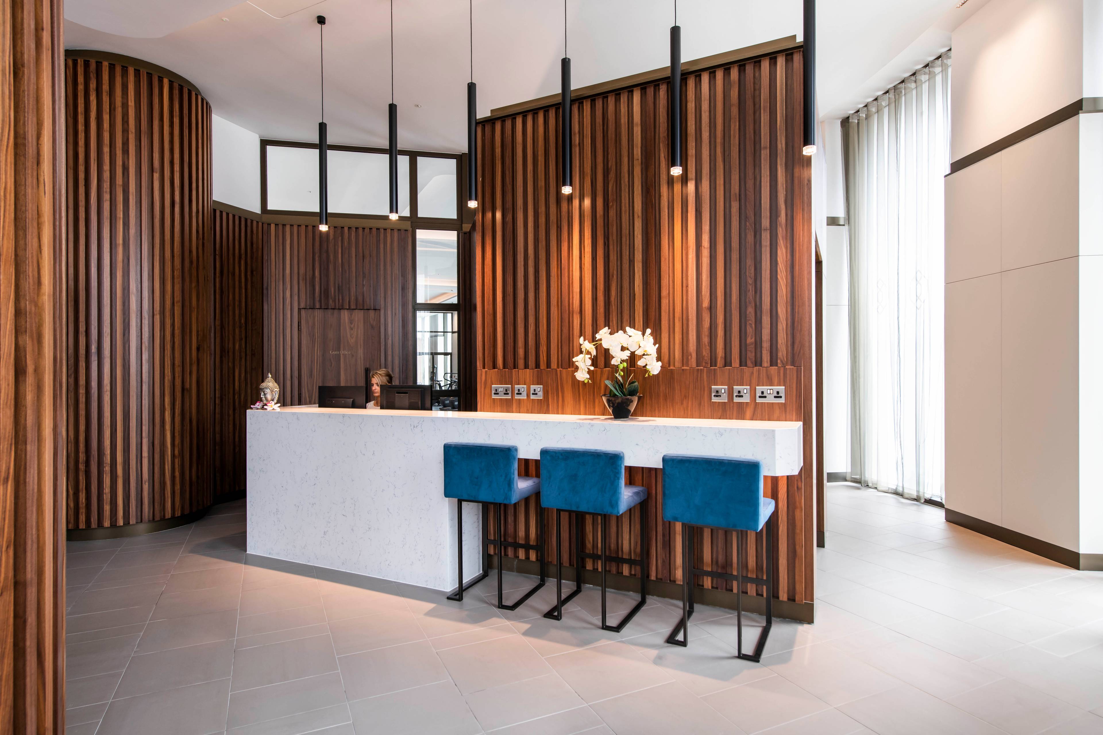 A modern three-bedroom apartment in the luxurious Garrett Mansions development.