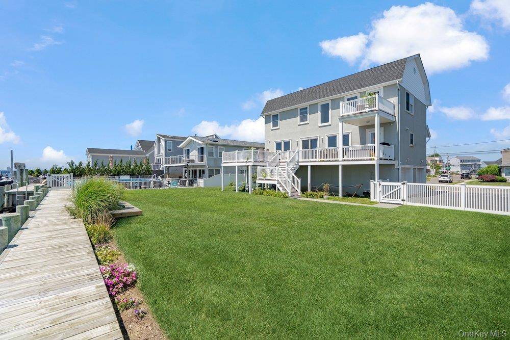 Exceptional waterfront diamond Post-Modern Colonial in Babylon