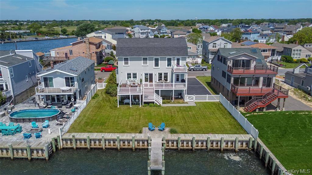 Exceptional waterfront diamond Post-Modern Colonial in Babylon