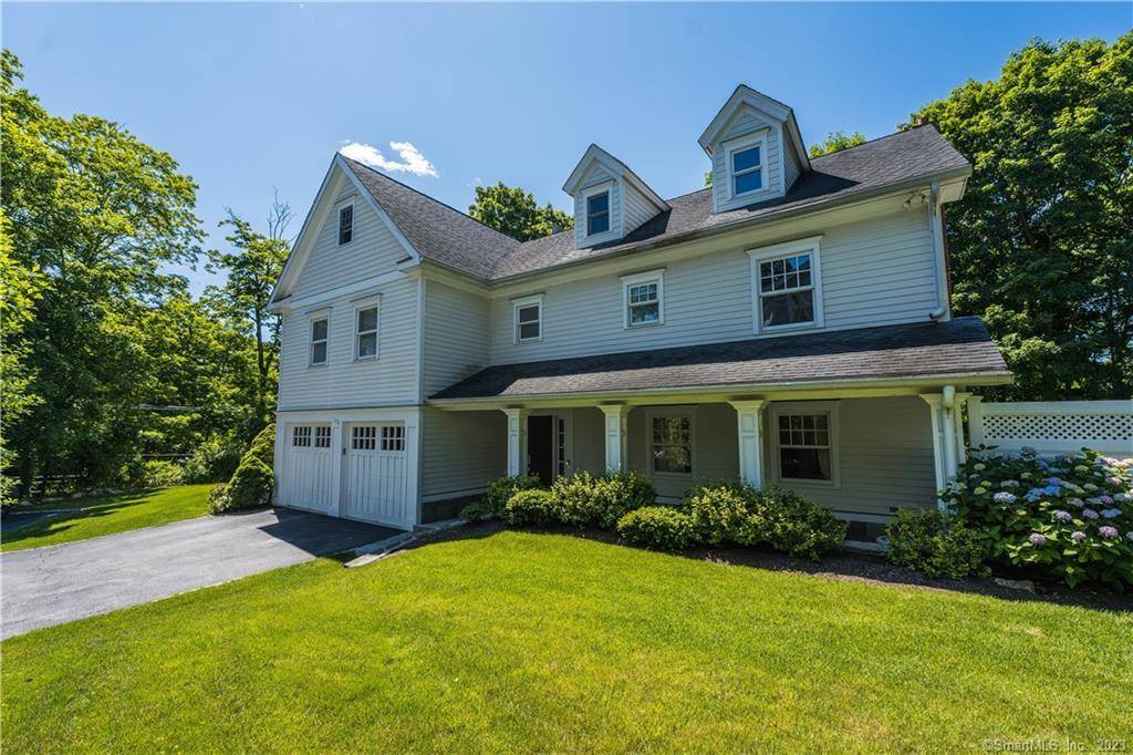 Updated Spacious Cos Cob Colonial with Open Layout, Deck & Private Yard