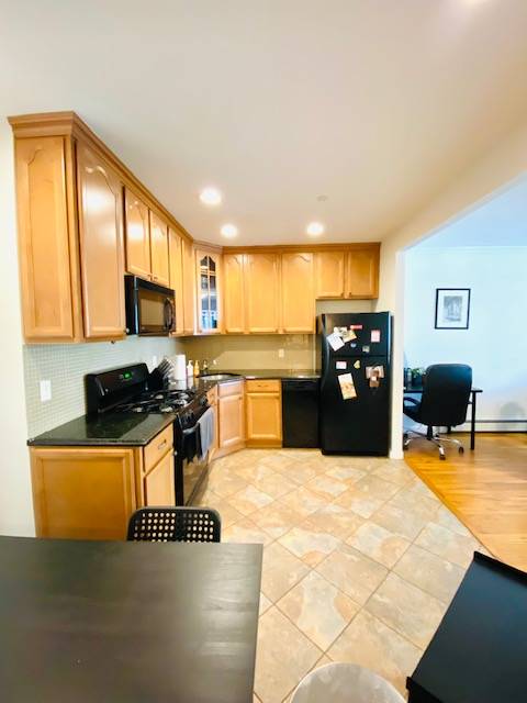 Stunning True One Bedroom boasting chic condo finishes, private outdoor space - PRIME Astoria Location - One Block from the train - Washer Dryer In Building