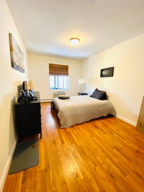 Stunning True One Bedroom boasting chic condo finishes, private outdoor space - PRIME Astoria Location - One Block from the train - Washer Dryer In Building