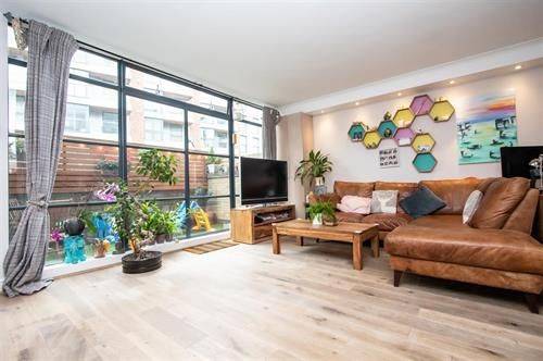 Spacious & Stylish One-Bedroom Garden Apartment with Underground Parking – Brentford, TW8