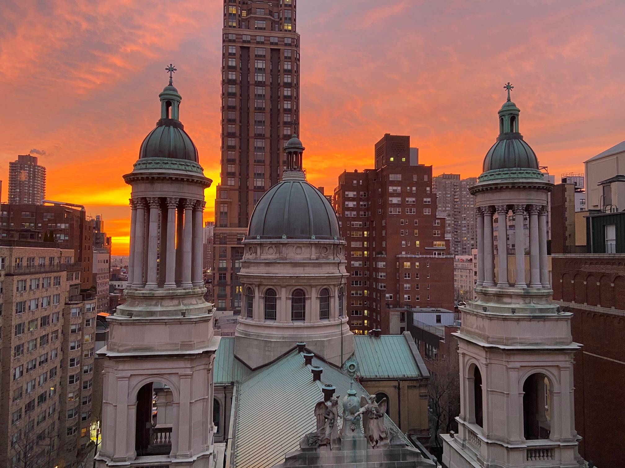 Sun-filled convertible 2 bedroom, one bath home with breathtaking views of Jean Baptist Cathedral from your own private terraces