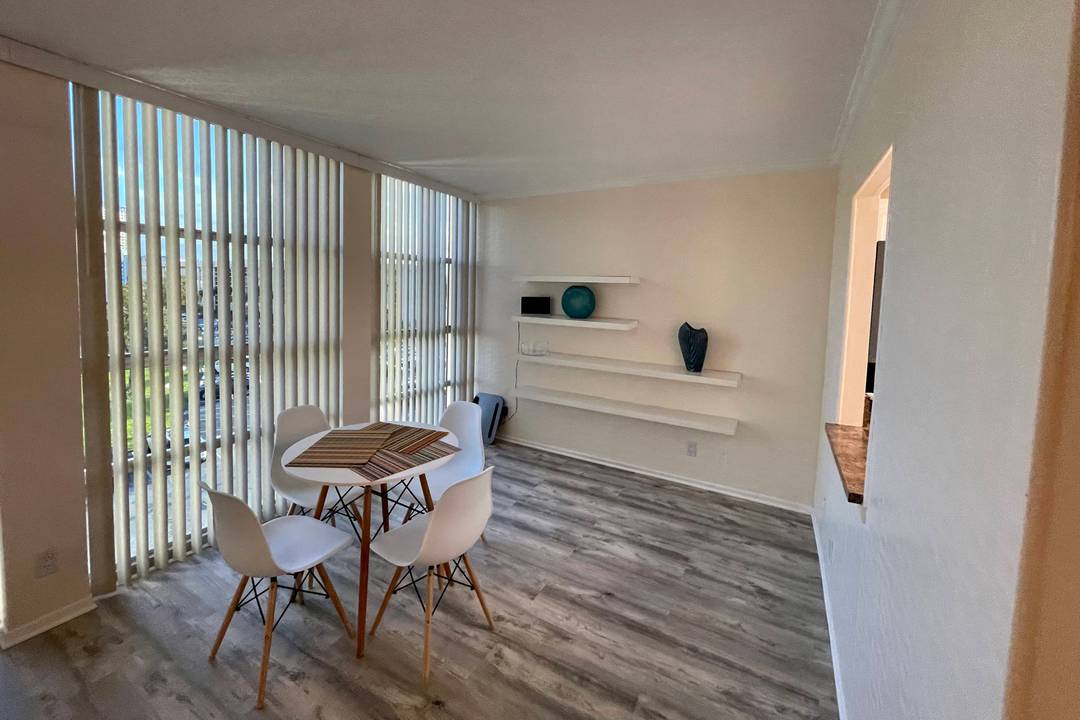 Waterfront Apartment in Three Islands, Hallandale Beach with Private Tennis Court | 1 Bed + Den | 1.5 Baths | 940 sqft