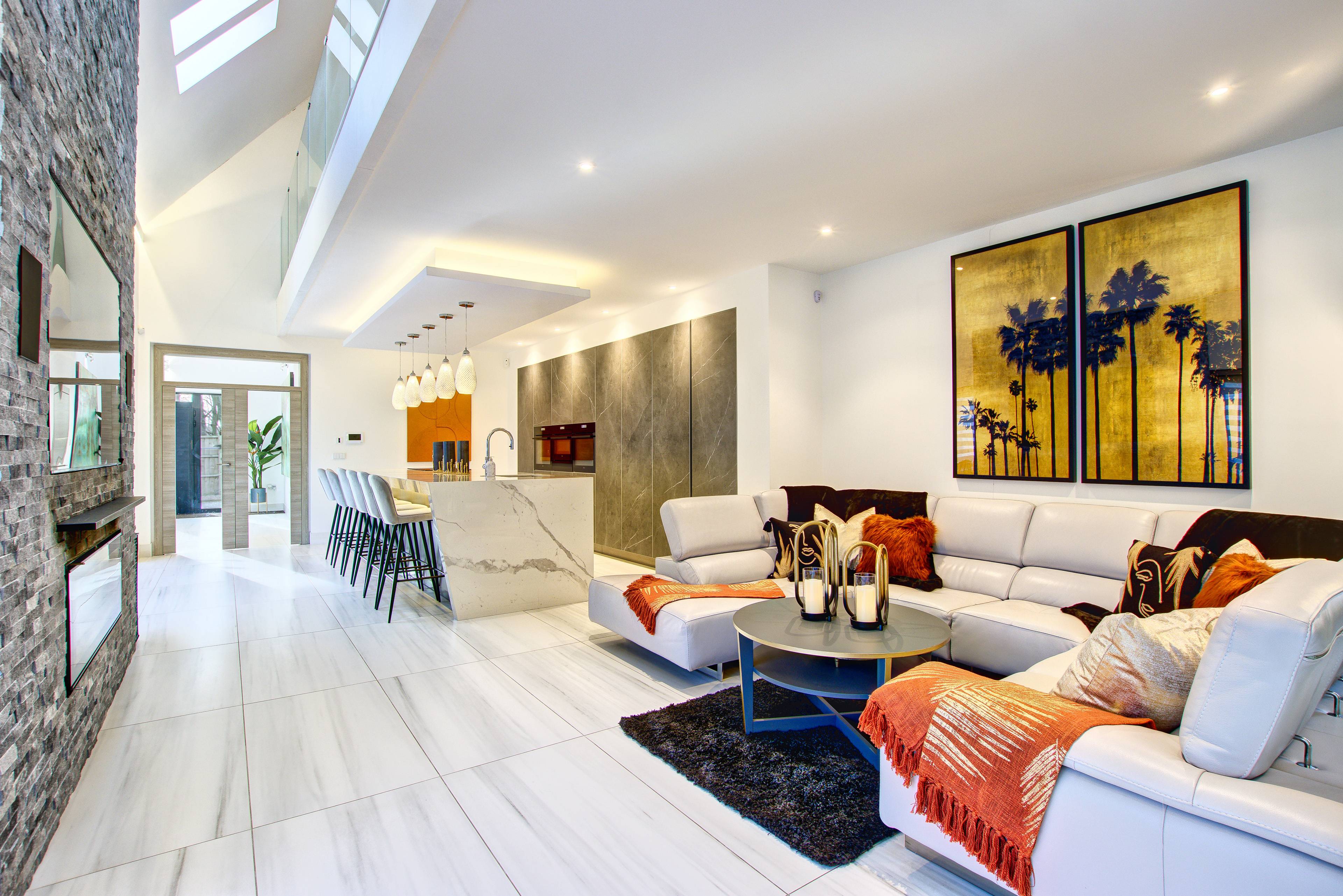 An exceptional luxury four bedroomed home extending to 4600 sq ft on a secure private plot with fully landscaped gardens, expansive contemporary open plan living area and a stylish self contained one bedroomed annexe.