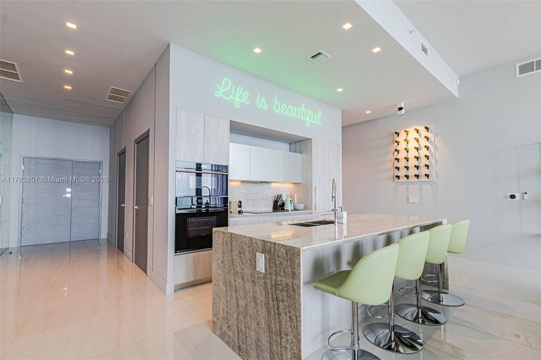 Turn-Key Furnished Penthouse with Soaring 14’ Ceilings | 3Bed | 3 Bath