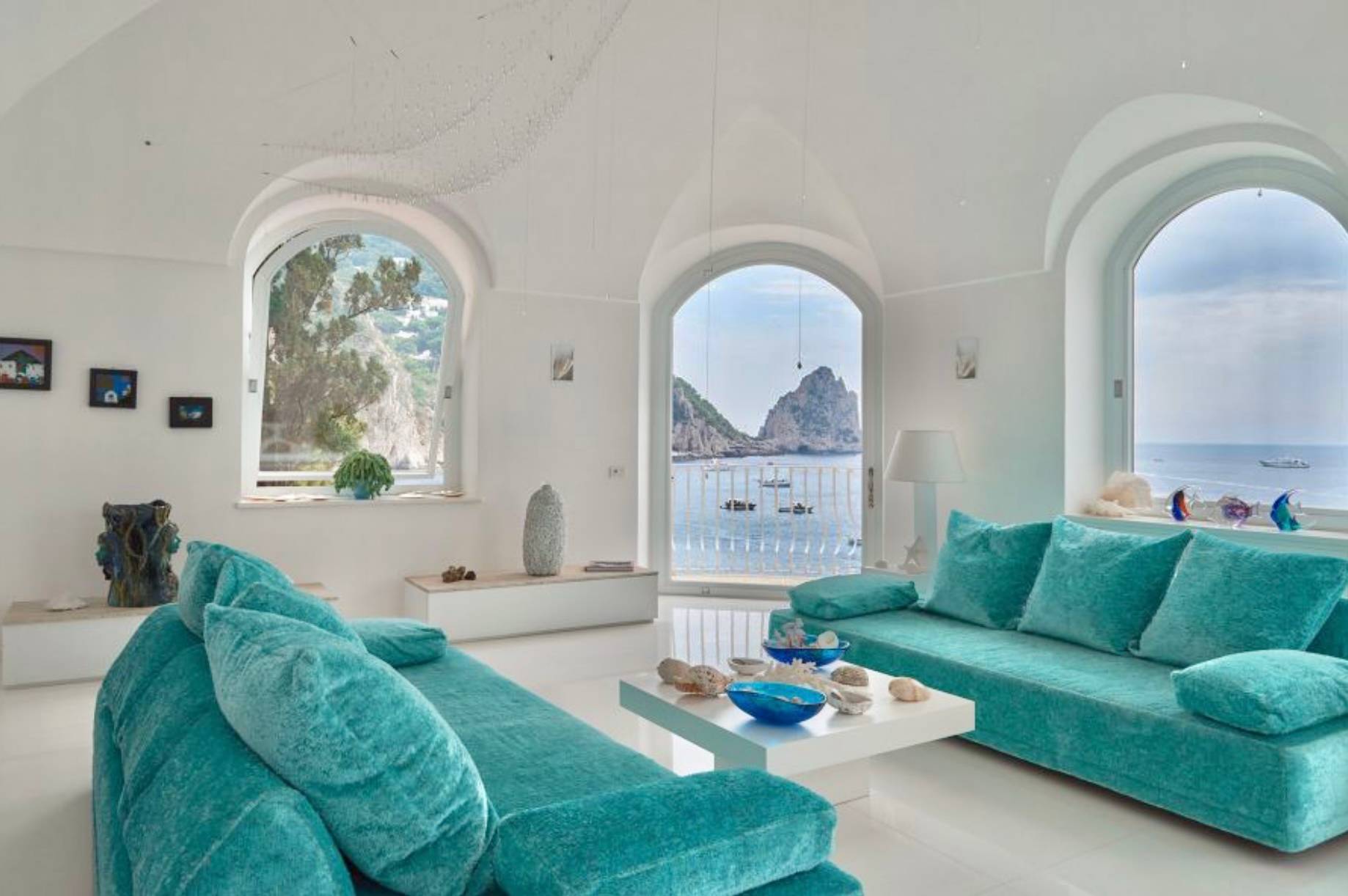 Experience exclusivity in Capri with Villa Torre Saracena: the only one with private beach club and pier.
