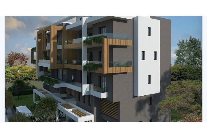 A modern five-storey building. /  Maisonette