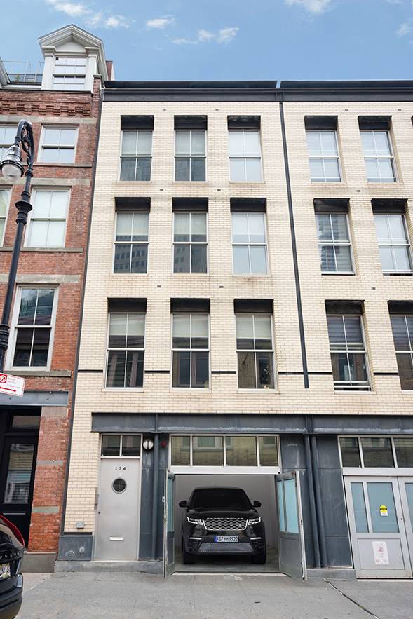 Renovated Townhouse in the Historic Seaport with Private Garage and Rooftop!