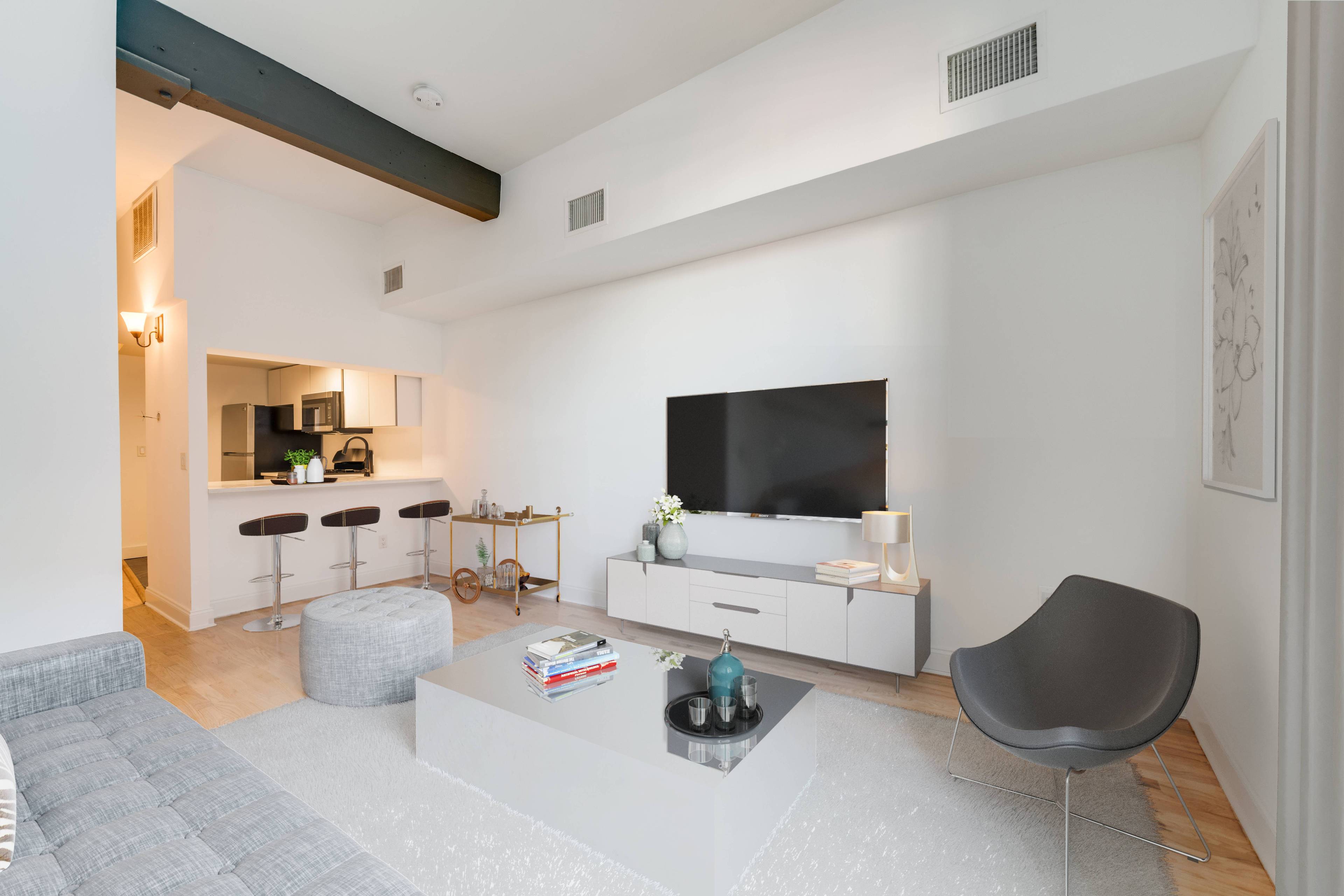 Beautiful Open and Spacious 2 Bedroom 1.5 Bathroom Soho Loft Duplex located at the Grand Adams in Downtown Hoboken! 2 Months Free on a 14 Month Lease! Washer/Dryer In Unit.