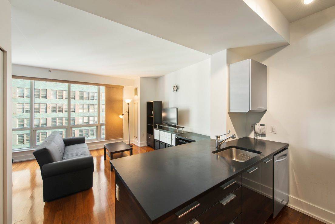 HIGH-FLOOR, OVERSIZED ALCOVE STUDIO  CONDO WITH VIEWS FOR SALE