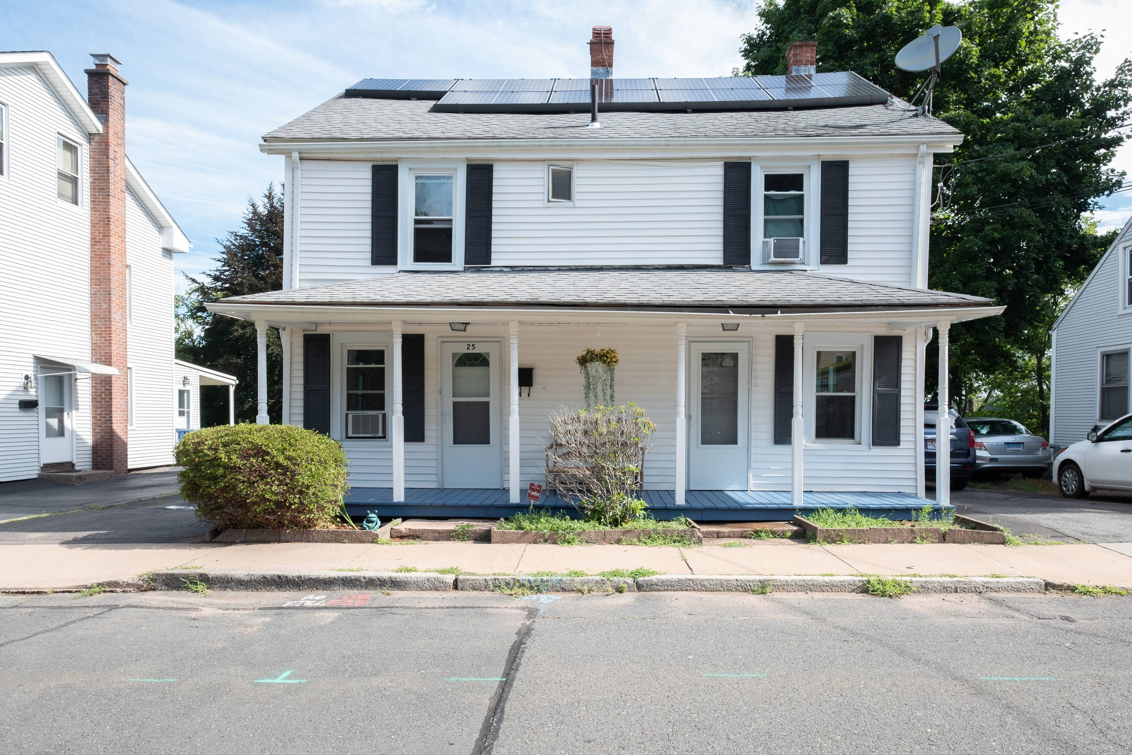 One of a kind converted two family waterfront home!