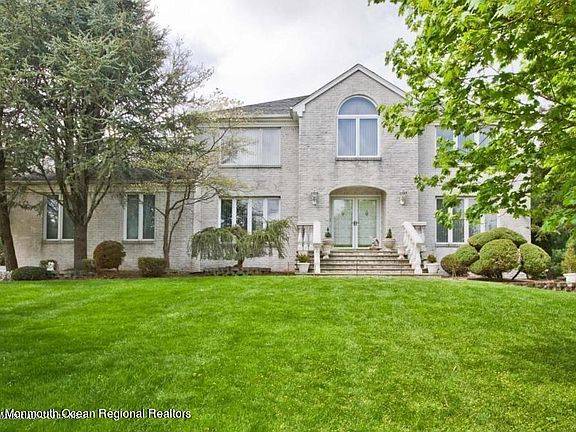 Beautiful Brick Front Center Hall Colonial Home