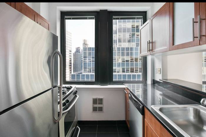 Two Bedroom Flex 3,  Full Service Building, Prime Downtown Location