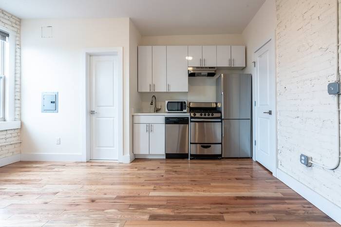 Studio- Stunning Renovated Studio in Prime Journal Square Location! Laundry on Site, Seconds to the Journal Square Path Transportation Center!
