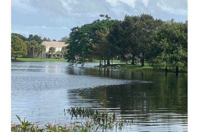 Pristine, Turnkey, Water views, Gated Eco-Friendly Highly Desirable Neighborhood