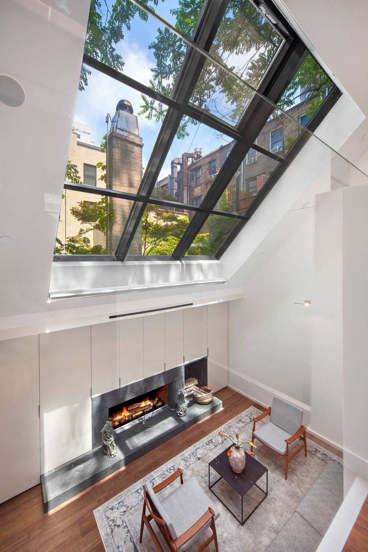 251 EAST 61ST STREET |THE TOWNHOUSE | WITH COVETED ATTACHED CARRIAGE HOUSE