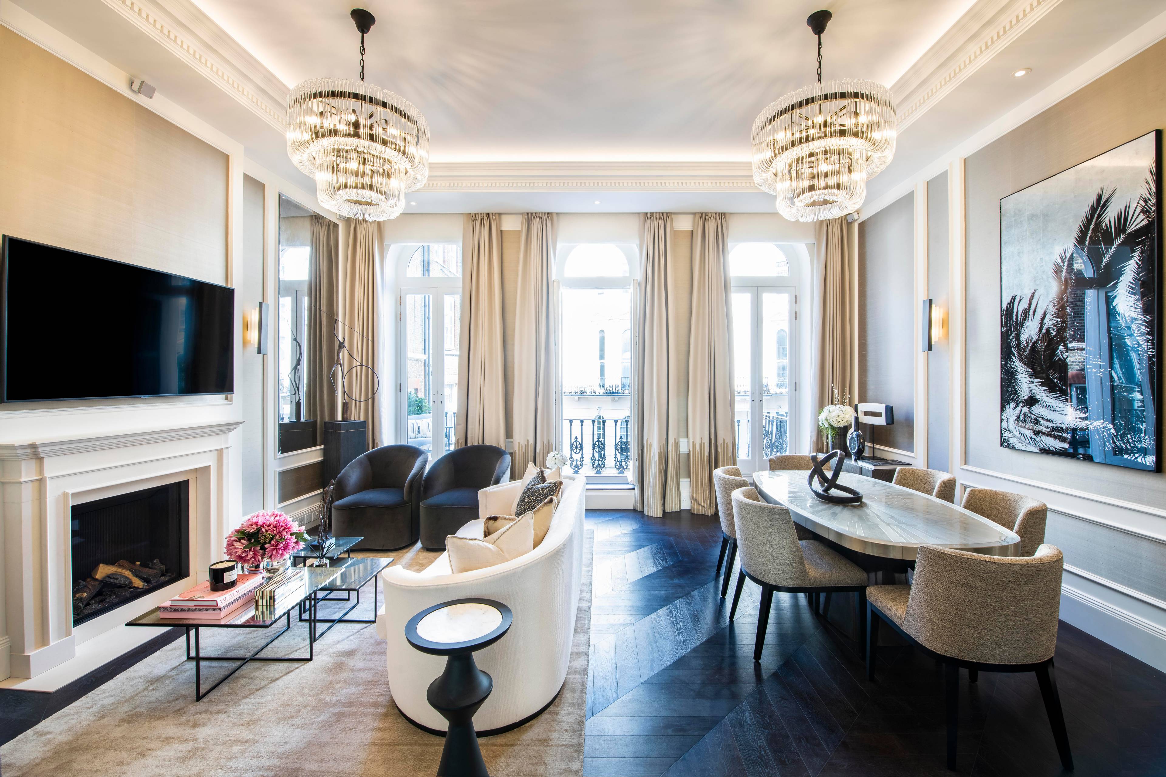 A tastefully decorated two-bedroom apartment in a portered building with a view of nearby rooftops towards Hyde Park