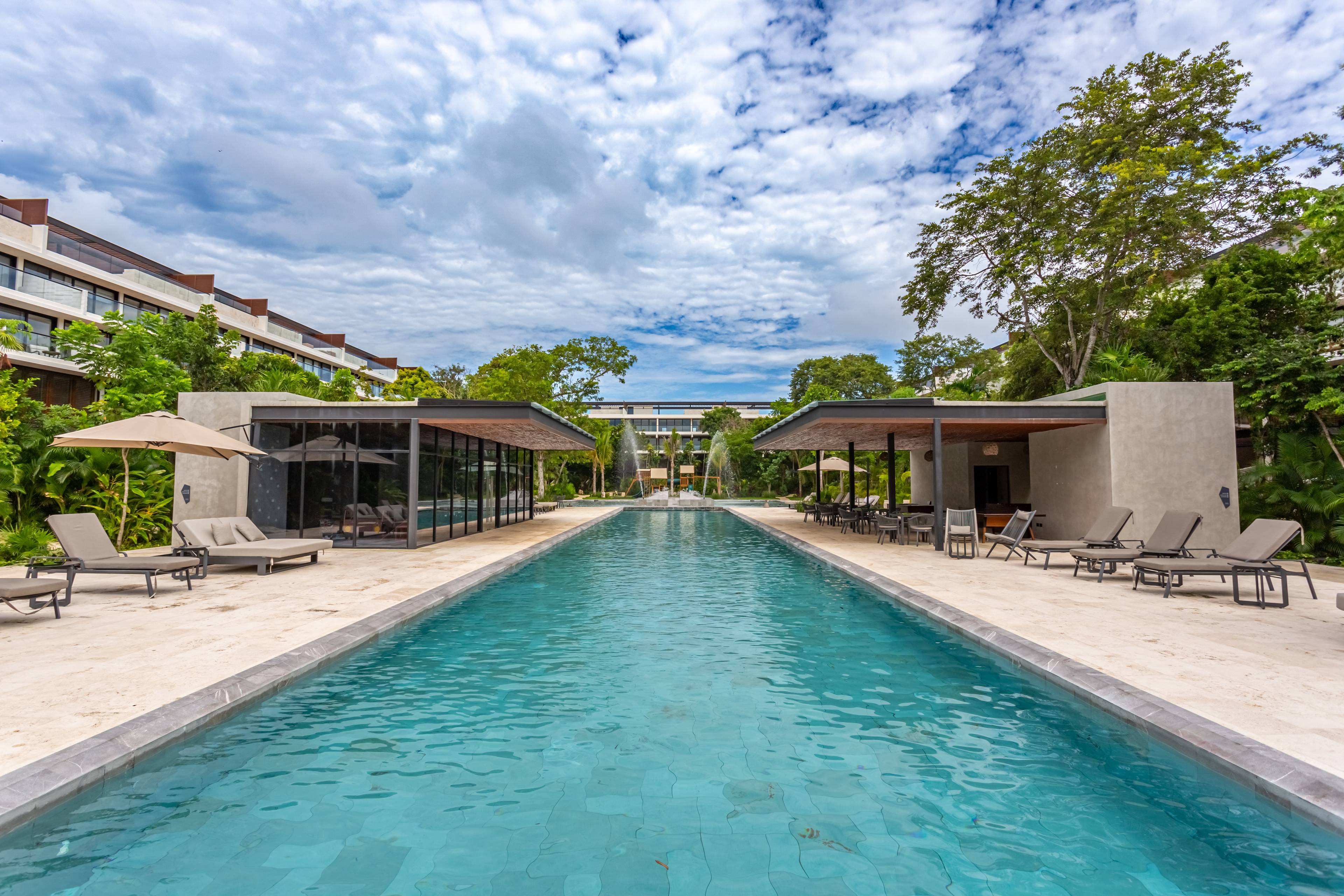 MAGAZINE GORGEOUS!  STYLISH 2-BEDROOM CONDO IN 5-STAR AWA RESIDENCES PLAYACAR - PLAYA DEL CARMEN